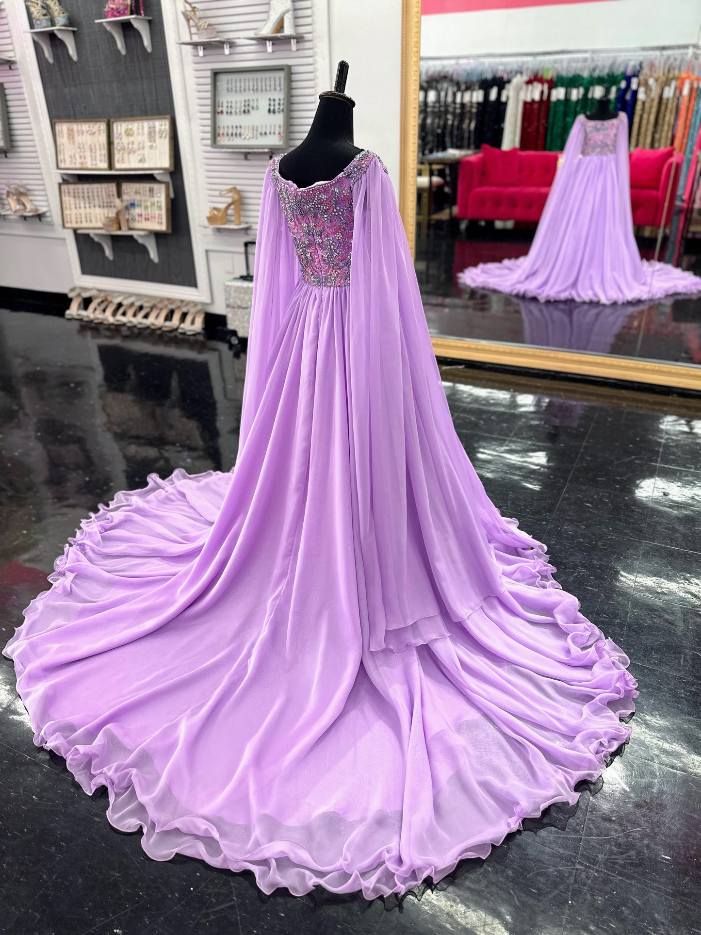 The Samantha Blade 1022 Girls Pageant Dress is the perfect choice for your little one's big day. With a stunning beaded crystal bodice and off-the-shoulder cape sleeves, she'll shine like a star. The chiffon ballgown train adds a touch of elegance and ensures she'll make a grand entrance.