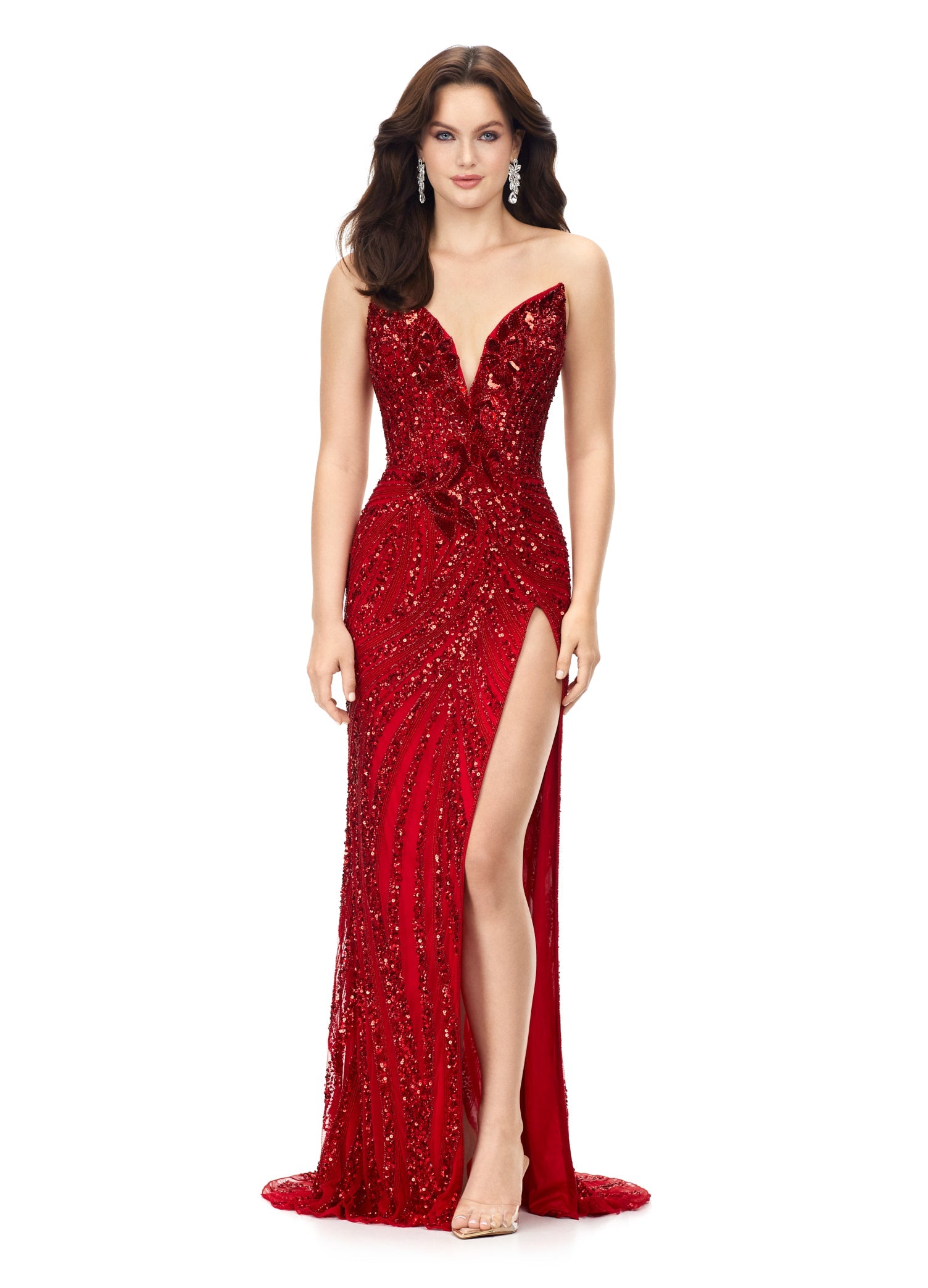 Ashley Lauren 11236 Long Fitted V Neck Slit Beaded Sequin Prom Dress Pageant Gown This strapless gown is sure to turn heads. The sweetheart neckline is complete with a modern floral sequin motif that continues down the bustier and skirt. The skirt is complete with a left leg slit. Strapless Bustier Left Leg Slit Fully Hand Beaded COLORS: Gold, Rose Gold, Gold/Black, Sky/Nude, Gold/Ivory, Fuchsia/Black, Purple, Red, Fuchsia, Bright Pink, Blue/Jade Sizes: 0-16