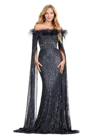 Expertly crafted by Ashley Lauren, the 11429 Long Prom Dress is a stunning piece that combines fully sequined fabric, delicate feathers, and elegant floor-length sleeves. Perfect for formal events and pageants, this gown is sure to make you stand out with its unique design and impeccable craftsmanship. Bring all the glamour in this fully beaded gown with floor length sleeves. The feather details take this look to the next level.