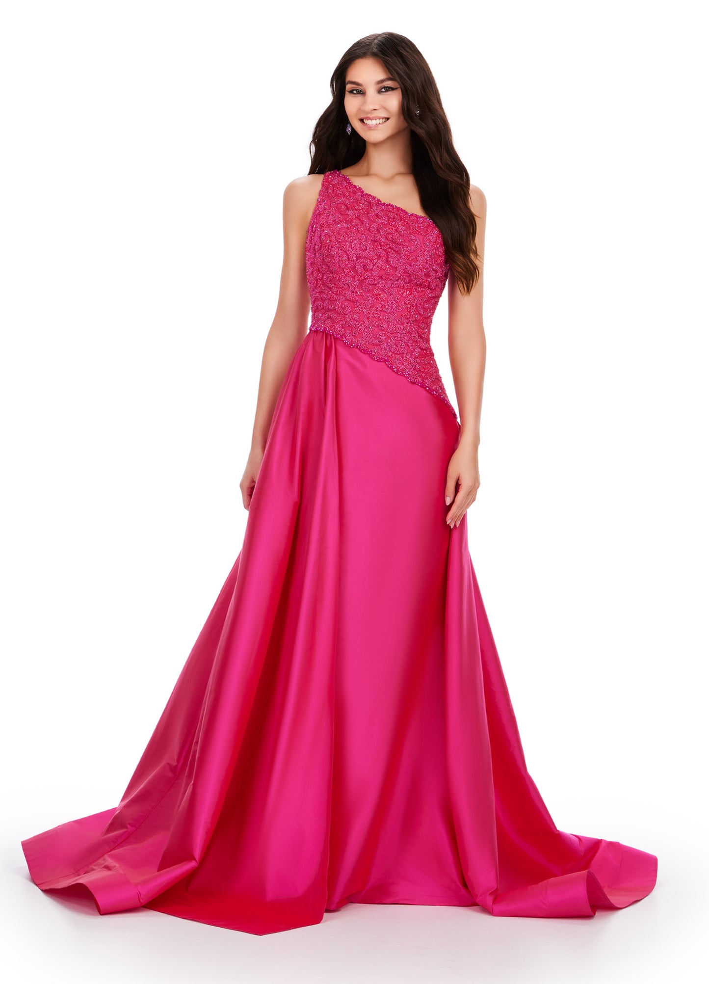 This Ashley Lauren 11456 Long Prom Dress features a one shoulder design with a beautiful taffeta fabric and a stunning beaded bodice. Elevate your formal look with this pageant-worthy gown. Expertly crafted with attention to detail, this dress is sure to make a statement. A dress sure to make you feel like royalty! This one shoulder gown features a fully beaded bodice and a dramatic taffeta overskirt.