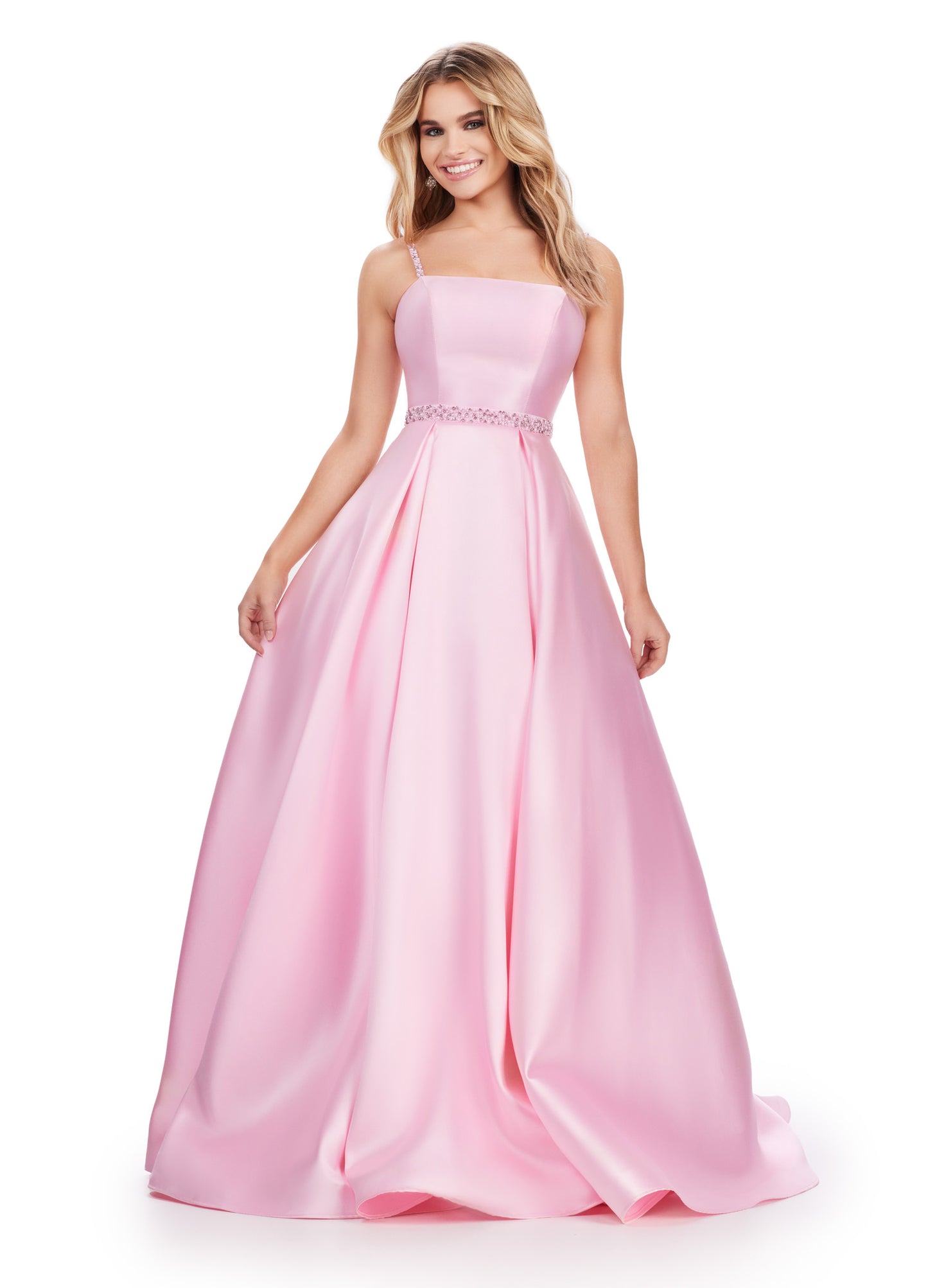 Be the belle of the ball in the Ashley Lauren 11540 Long Prom Dress. This elegant spaghetti strap mikado ball gown features beaded straps and a flattering belt, perfect for your next formal event or pageant. Expertly designed for a stunning and sophisticated look. Dare to be remembered in this one shoulder gown with elegant draping. The fitted skirt is complete with a side skirt that is sure to turn heads. The unique lace up back is sure to provide an exceptional fit.