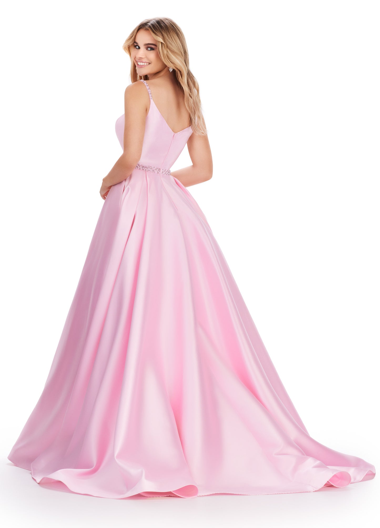 Be the belle of the ball in the Ashley Lauren 11540 Long Prom Dress. This elegant spaghetti strap mikado ball gown features beaded straps and a flattering belt, perfect for your next formal event or pageant. Expertly designed for a stunning and sophisticated look. Dare to be remembered in this one shoulder gown with elegant draping. The fitted skirt is complete with a side skirt that is sure to turn heads. The unique lace up back is sure to provide an exceptional fit.