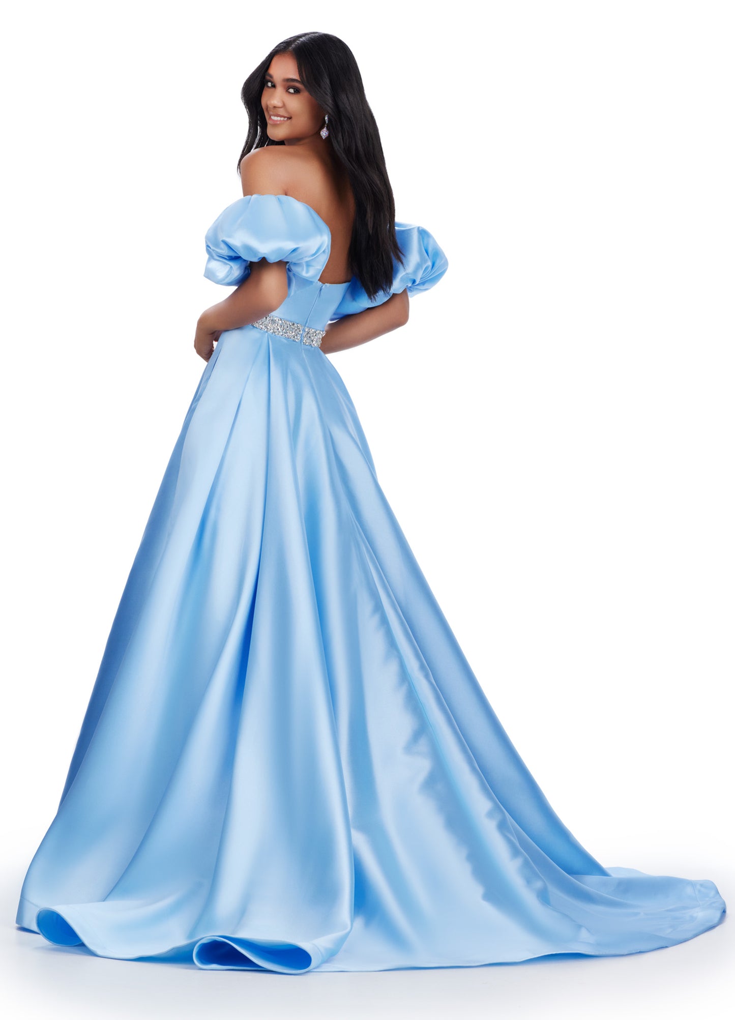 Elevate your formal look with the Ashley Lauren 11543 Long Prom Dress. The off-shoulder, puff sleeve design exudes elegance while the Mikado ball gown silhouette adds drama. Perfect for proms, pageants, and other formal occasions. his classic strapless Mikado ball gown features a beaded waist band. The look is complete with detachable puff sleeves.