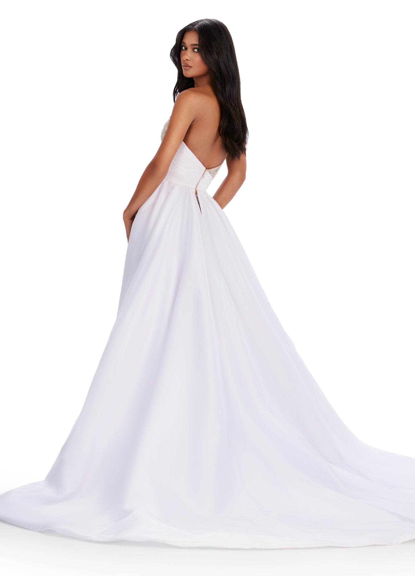 Elevate your formal attire with the Ashley Lauren 11571 long prom dress. Adorned with intricate beadwork and a taffeta belt, this gown exudes elegance and sophistication. The overskirt adds a touch of glamour to the look. Perfect for prom, pageants, or any special occasion. This strapless ball gown features a velvet bustier accented with crystal detailing at the waist. Feathers accent the scattered beading on the organza tiered ruffle skirt.