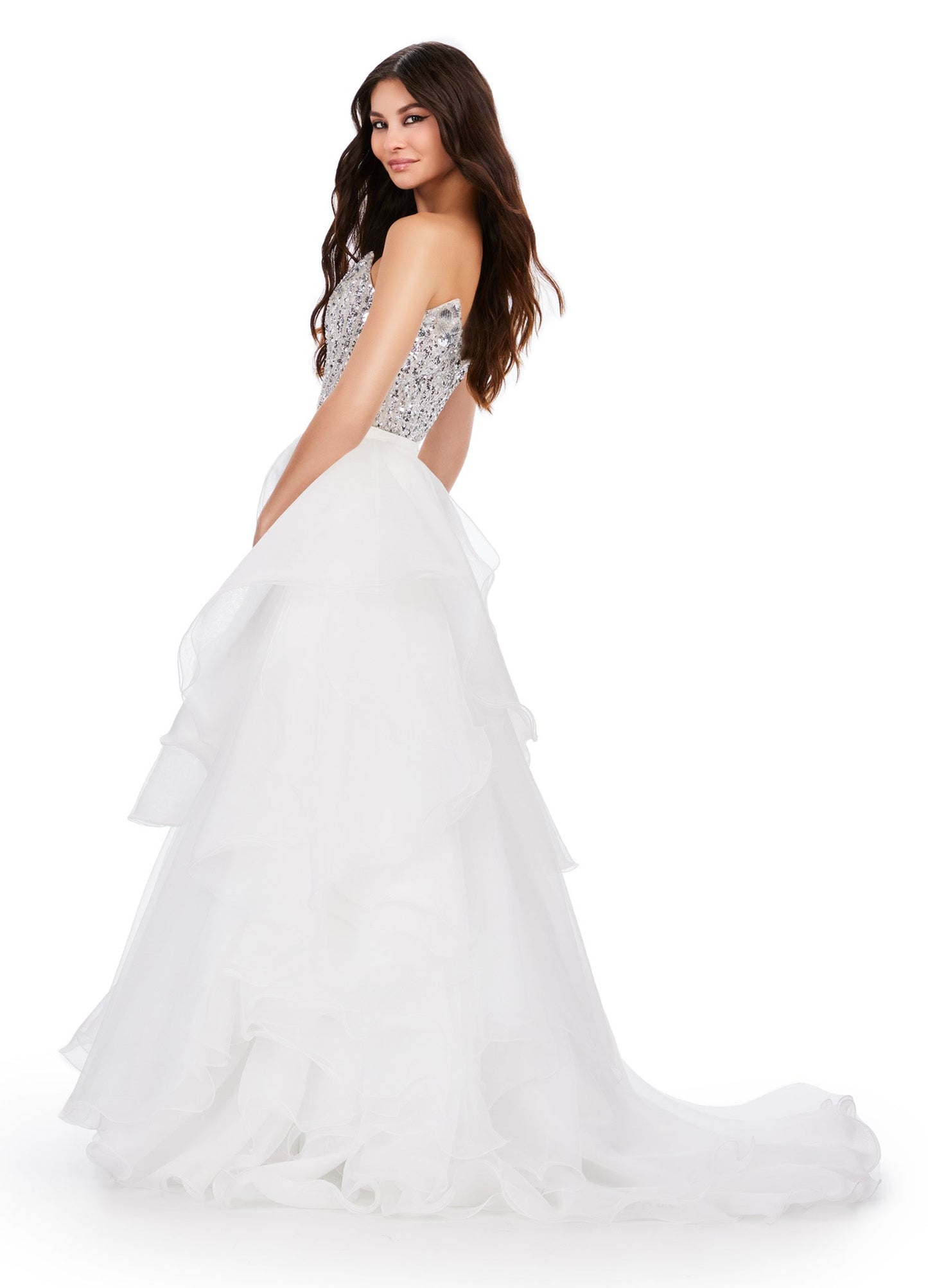 Get ready to make a statement at your next formal event with the Ashley Lauren 11601 Long Prom Dress. This elegant gown features a stunning organza ruffle side overskirt with a daring slit, perfect for showing off your legs. Complete with a formal pageant-worthy design, you'll be sure to turn heads all night long. An overskirt that is here to slay! This fabulous ruffle organza side overskirt is sure to look incredible with your next look. Pair it with your favorite ASHLEYlauren dress, jumpsuit or cocktail.