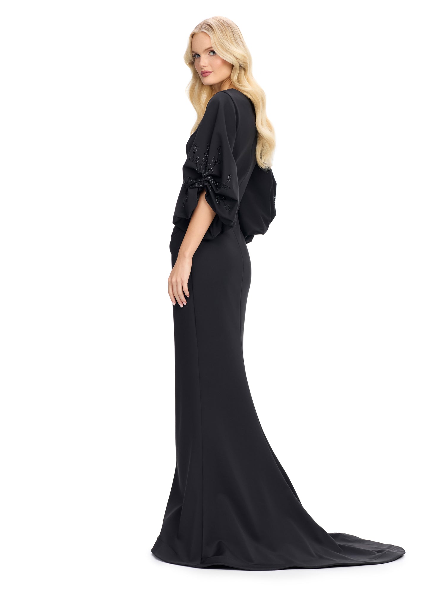 Elevate your evening look with the stunning Ashley Lauren 11740 Long Gathered Sleeves Evening Gown. The scuba fabric provides a sleek and comfortable fit, while the belted waistline accentuates your figure. The gathered sleeves add an elegant touch to this chic gown, making it perfect for any special occasion.