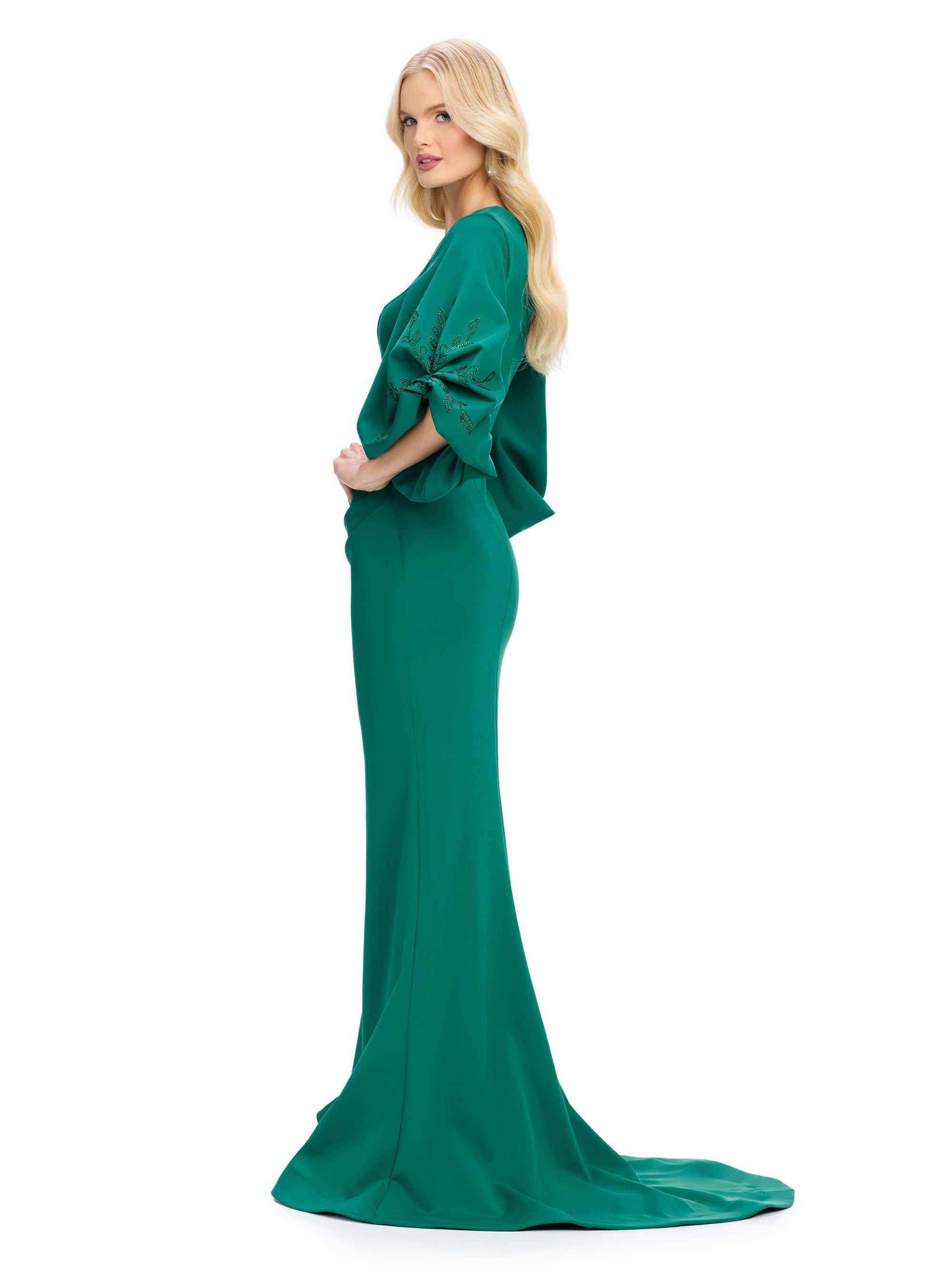 Elevate your evening look with the stunning Ashley Lauren 11740 Long Gathered Sleeves Evening Gown. The scuba fabric provides a sleek and comfortable fit, while the belted waistline accentuates your figure. The gathered sleeves add an elegant touch to this chic gown, making it perfect for any special occasion.