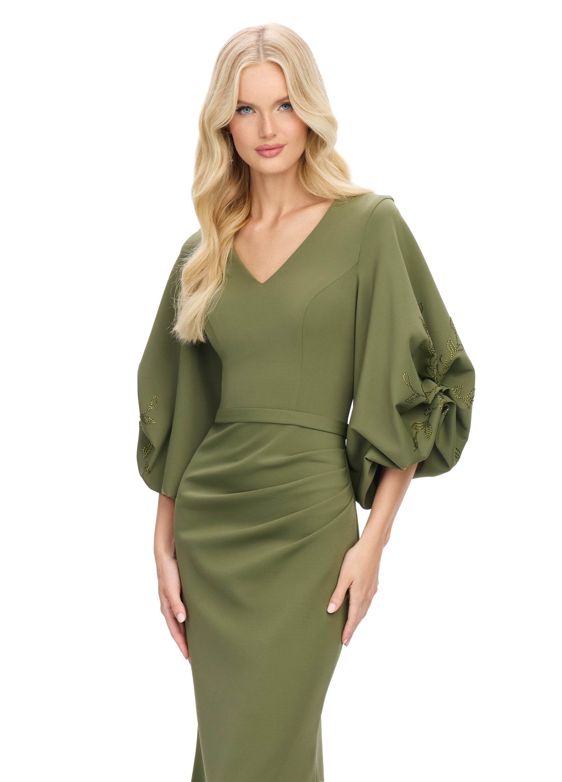 Elevate your evening look with the stunning Ashley Lauren 11740 Long Gathered Sleeves Evening Gown. The scuba fabric provides a sleek and comfortable fit, while the belted waistline accentuates your figure. The gathered sleeves add an elegant touch to this chic gown, making it perfect for any special occasion.