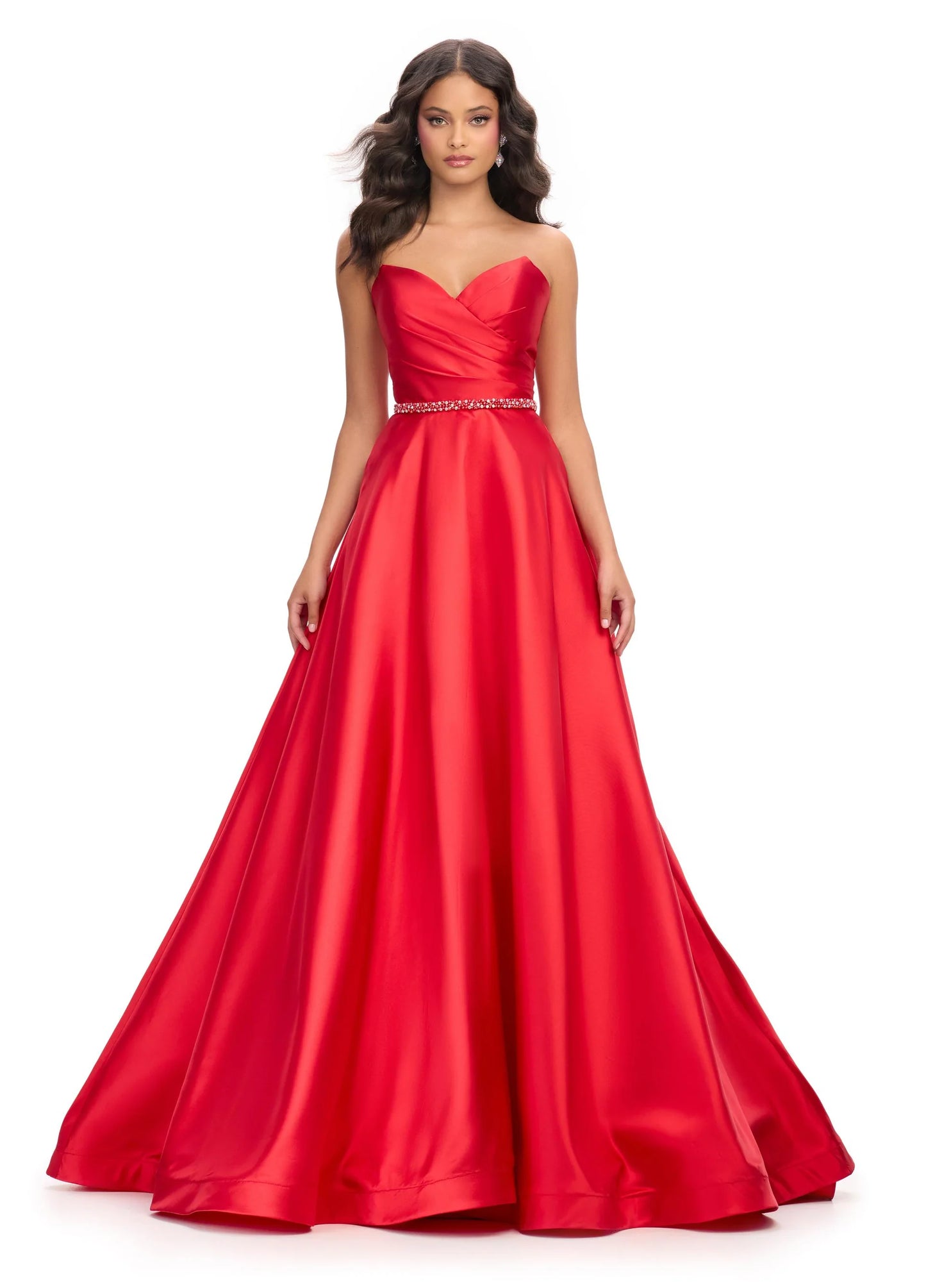 Elegant and sophisticated, the Ashley Lauren 11773 Strapless Ballgown is perfect for any formal occasion. The ruched bodice and crystal belt add subtle details, while the strapless design allows for comfortable wear. Made with high quality materials, this dress is sure to make a statement.