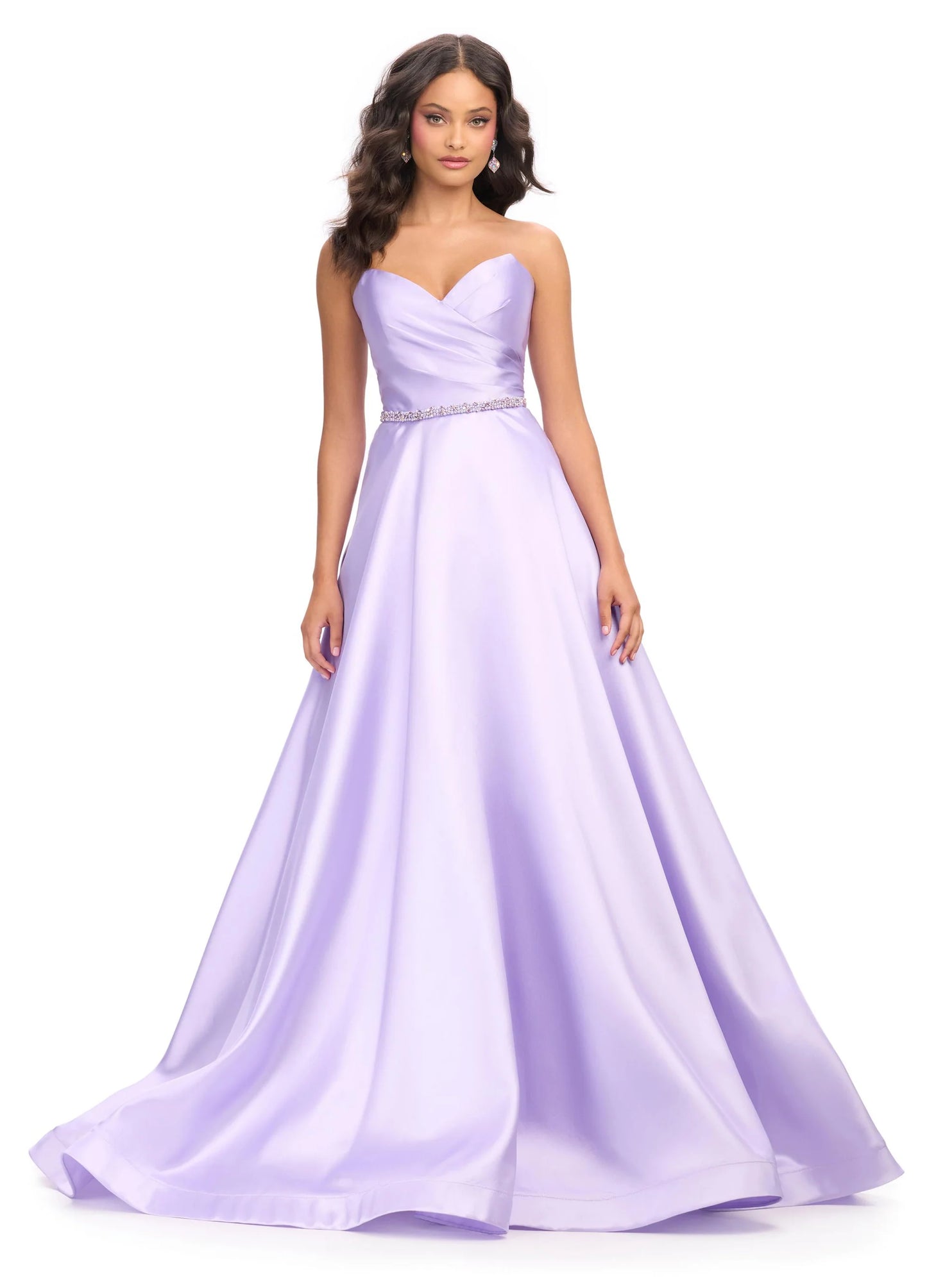 Elegant and sophisticated, the Ashley Lauren 11773 Strapless Ballgown is perfect for any formal occasion. The ruched bodice and crystal belt add subtle details, while the strapless design allows for comfortable wear. Made with high quality materials, this dress is sure to make a statement.