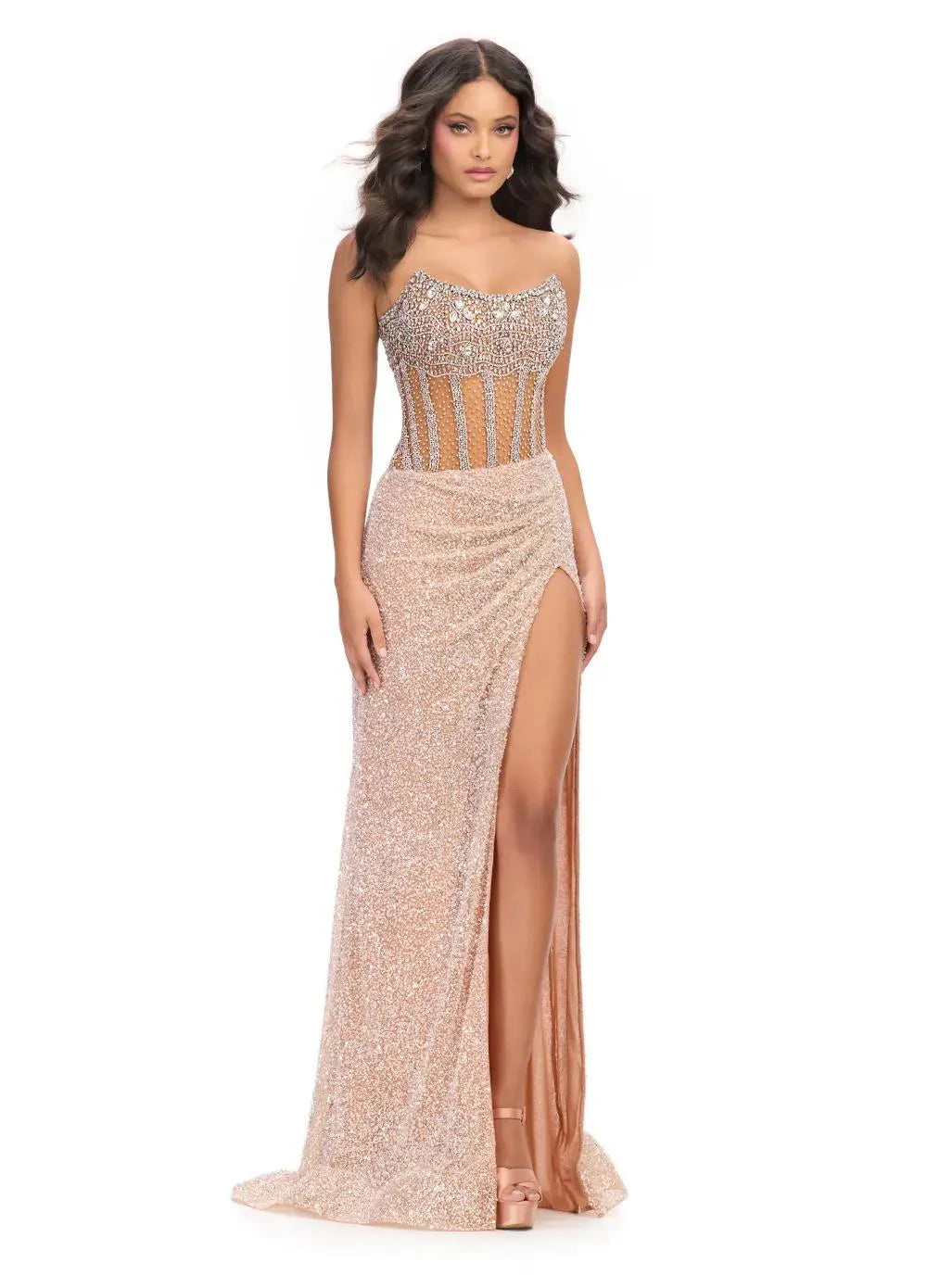 The Ashley Lauren 11830 Prom Dress is a stunning choice for any formal occasion. Adorned with sequins and sheer crystal detailing, this strapless corset gown exudes elegance and luxury. The slit adds a touch of allure while the corset provides a flawless fit. Perfect for making a statement on any red carpet event or pageant stage