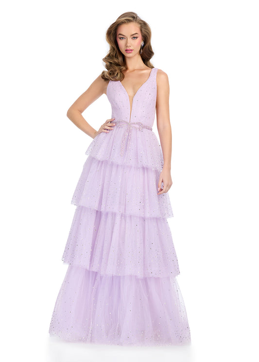 Elevate your formal wear with the Ashley Lauren 11894 Shimmer Layer Bow Prom Dress. This v-neck crystal gown boasts a sleek A-line silhouette that is both flattering and elegant. The shimmer layer adds a touch of glamour, while the bow detail adds a playful touch. Perfect for any formal occasion.