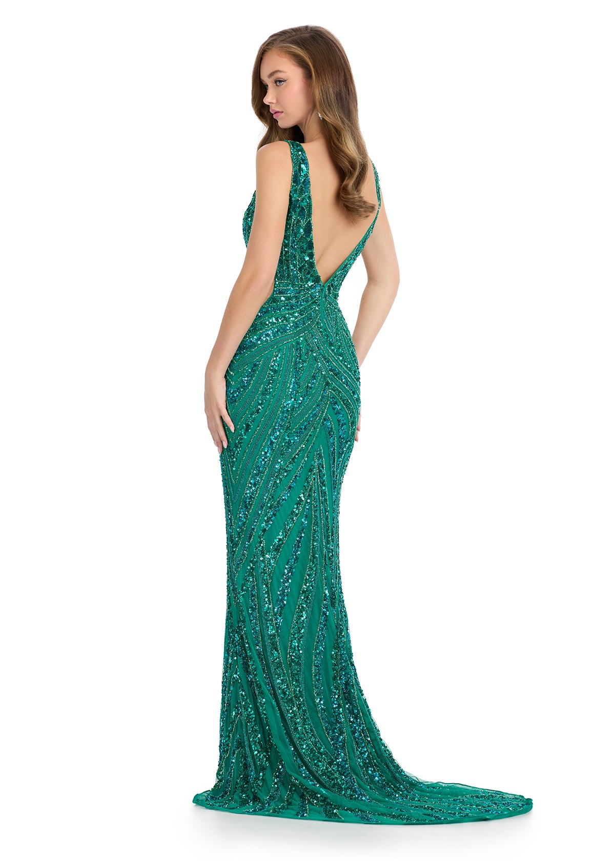 This elegantly crafted Ashley Lauren 11980 dress features a stunning V-neckline and intricate sequin beadwork, making it perfect for any formal event or prom night. Its form-fitting design and sleek backless cut effortlessly accentuate your figure. Shine with confidence in this timeless and glamorous pageant gown. Radiate elegance in this exquisite fully beaded gown, designed with captivating cut out mesh sides and a v-neckline. This stunning piece combines intricate detailing with a modern edge sure to mak