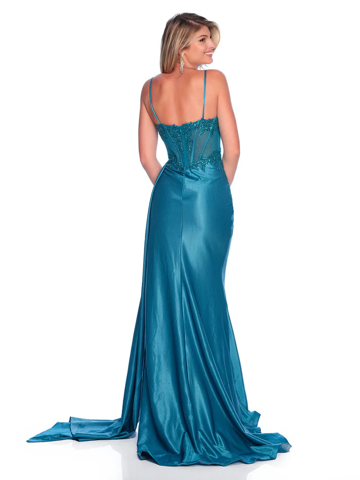 Be the center of attention in the stunning Dave &amp; Johnny 12247 prom dress. The sheer sequin lace corset adds a touch of glamour, while the slit overskirt offers a modern twist. Perfect for formal events and pageants, this gown will make you feel confident and elegant.

Sizes: 10

Colors: Teal