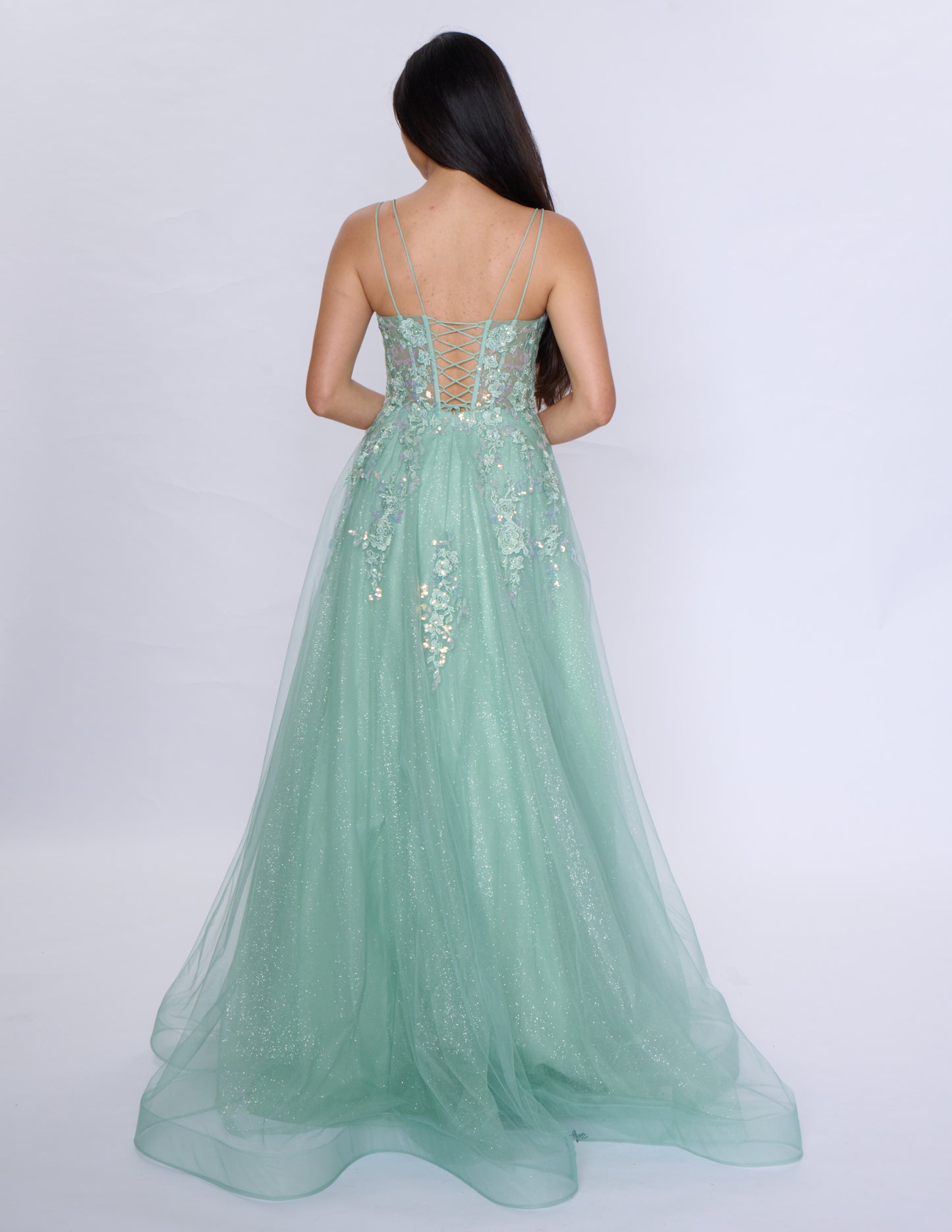 Get ready to make a statement at your next formal event with the Nina Canacci 1587 Sheer Corset Prom Dress. This stunning A Line dress features a beautiful sequin design and a scoop neck, creating a glamorous and sophisticated look. With its sheer corset and A-line silhouette, this dress is sure to turn heads and make you feel like a queen.

Sizes: 6-18

Colors: Sage, Light Blue