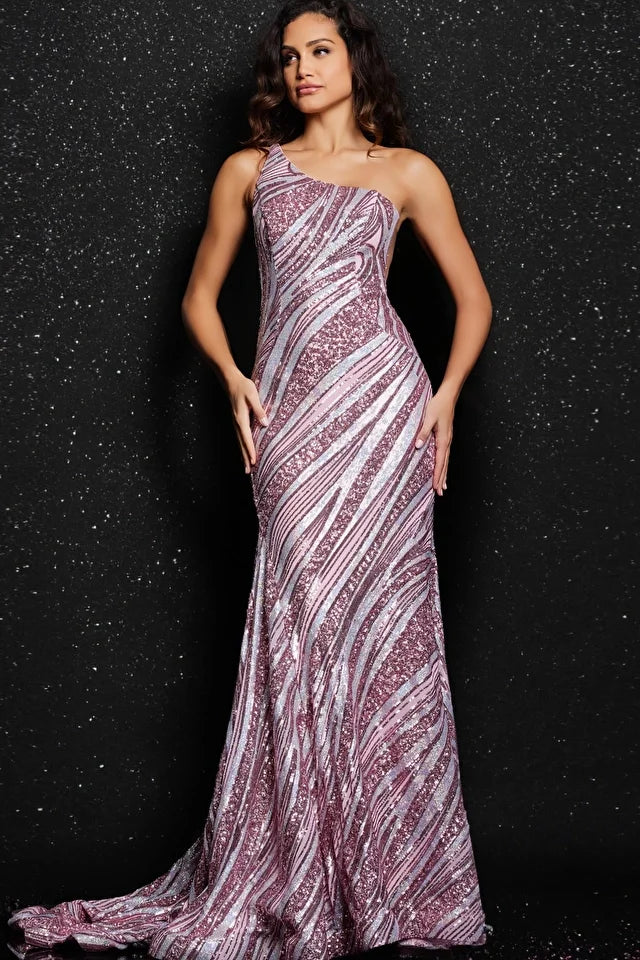 The Jovani 24031 is a glamorous prom dress designed to turn heads with its sophisticated details. This formal dress from the Jovani collection is crafted from sequin material, creating a dazzling and eye-catching effect. The fitted style enhances the natural curves of the wearer, providing a sleek and alluring silhouette. The dress features a sequin pattern throughout, adding a luxurious and opulent touch. 