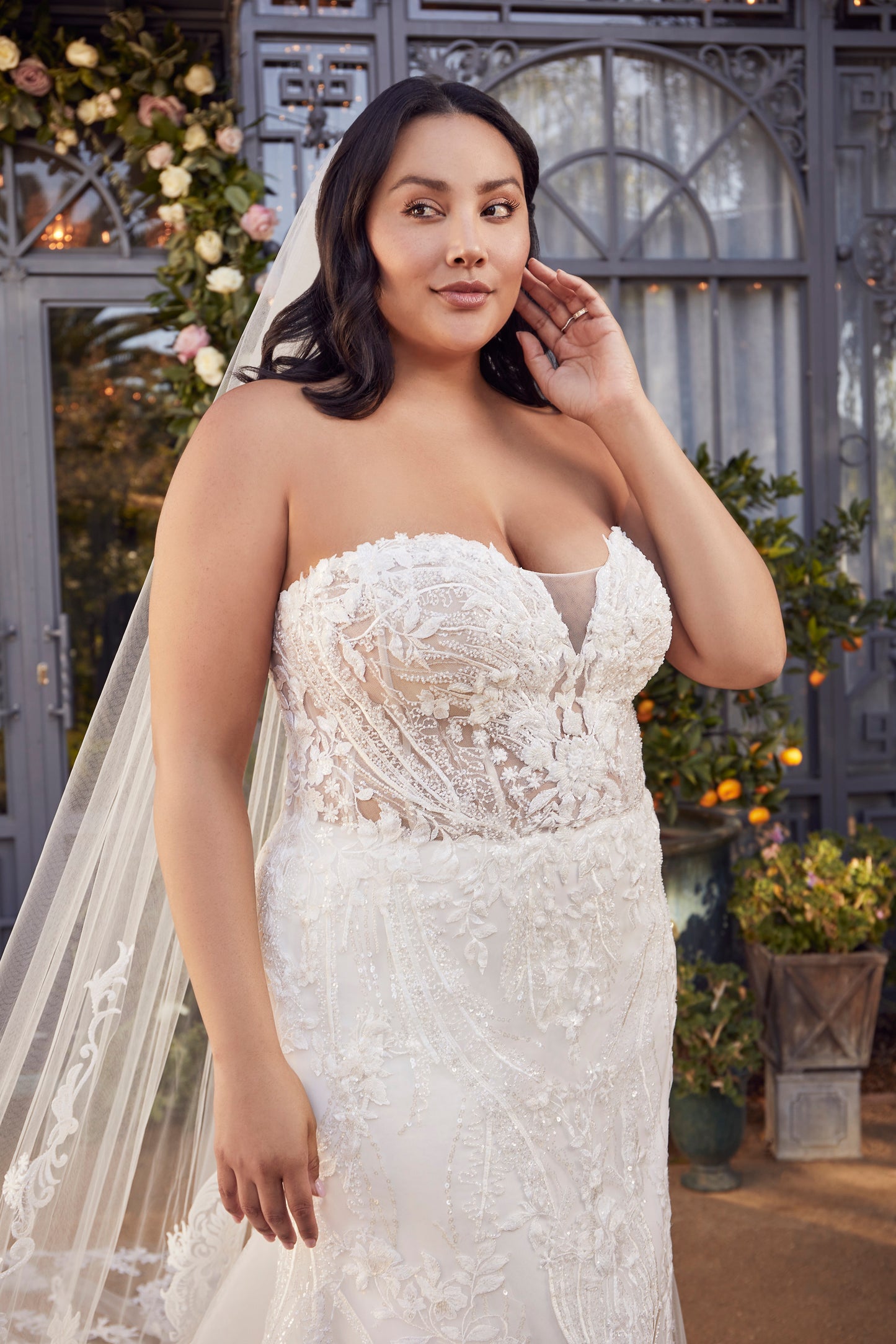 Indulge in luxury and grace with the Casablanca 2477 beaded mermaid wedding dress. The stunning long sleeve, strapless design is embellished with intricate beading, adding a touch of glamour to your special day. The fitted silhouette and elegant train will enhance your natural curves and leave you feeling like a true goddess. Artful and intricate, Style 2477 Delaney by Casablanca Bridal embodies storybook romance. Delicate lace, sequins, and beading sculpt the sweetheart neckline of this strapless fit and f