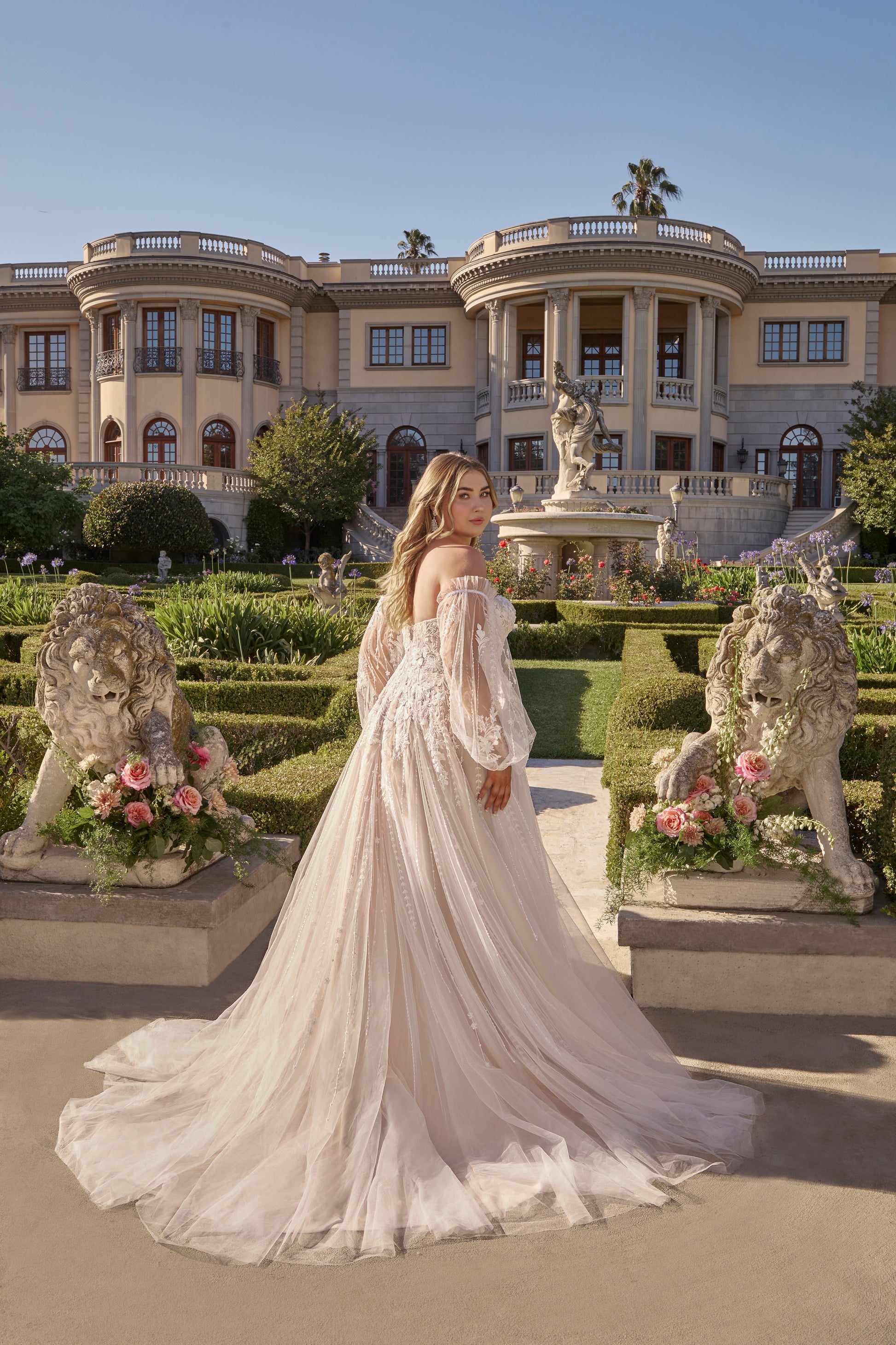 Introducing the epitome of elegance and luxury, the Casablanca Bridal 2496 wedding dress. With its stunning sheer beaded details and effortless A-line silhouette, this gown will make any bride feel like a work of art on her special day. The strapless design adds a touch of romance, making it the perfect choice for a bohemian-inspired wedding. Elevate your bridal look with this exclusive Casablanca creation. Let love bloom in Style 2496 Petal by Casablanca, an irresistibly sweet strapless A-line wedding dres