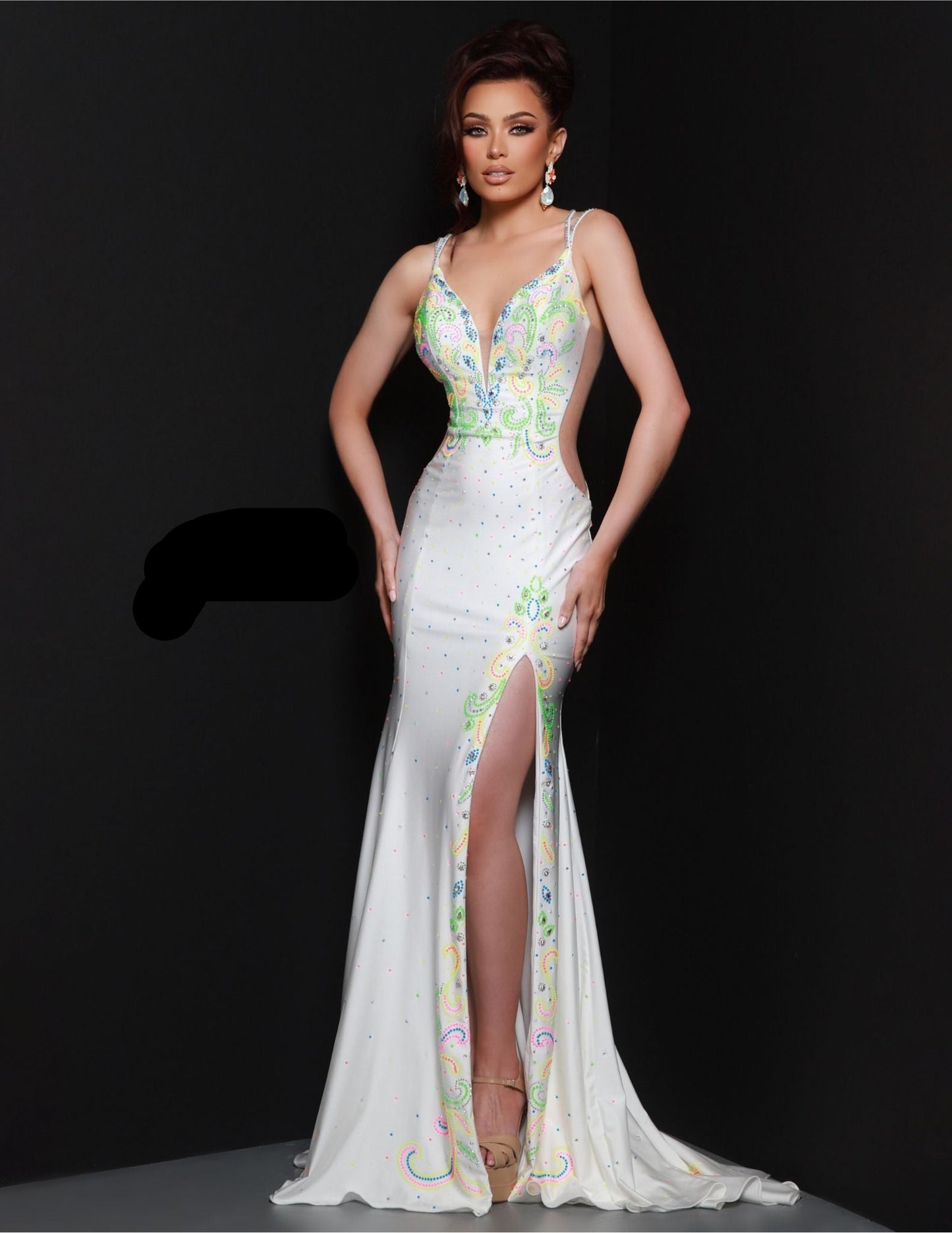 Elevate your formal attire with the stunning Johnathan Kayne 3004 Prom Dress. Embellished with sparkling crystal studs, this gown features a floral design and a sexy slit, exuding elegance and grace. The fitted silhouette will accentuate your curves, making you feel confident and beautiful. Perfect for prom or any formal event. Spice up your prom night with this ultra chic prom dress featuring a bright neon design, a leg slight for an extra dose of sass, and a stunning train that will have all eyes on you a