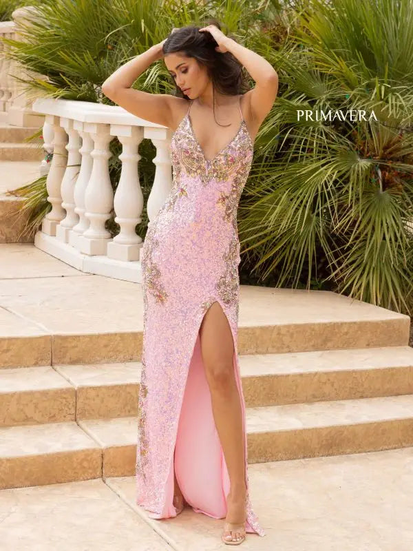 Primavera Couture 3211 is a Long fitted sequin Embellished Formal Evening Gown. This Prom Dress Features a deep V Neck with an open Corset lace up back. Beaded & embellished elegant scroll pattern accentuate curves. Fully beaded prom dress with floral pattern and side slit. Long Sequin Gown featuring a v neckline. slit in the fitted skirt, Slit in Thigh. Stunning Pageant Dress, Prom Gown & More!