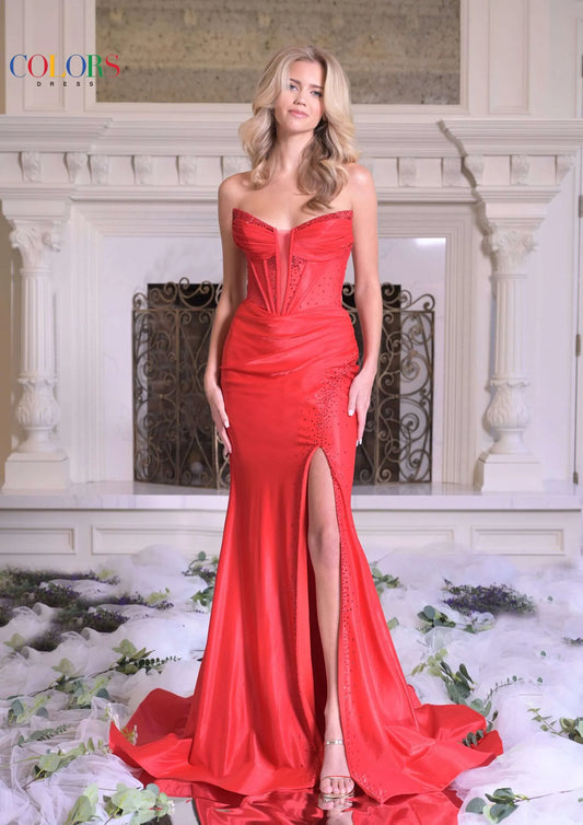 Expertly designed with a sheer v neck and corset-style bodice, the Colors Dress 3562 Prom Dress offers a sophisticated and alluring look for your special occasion. The crystal embellishments add an elegant touch, while the slit and backless design add a touch of playful flair. Elevate your formal attire with this stunning pageant gown.

Sizes: 0-16

Colors: Red, Lilac, Champagne, Turquoise