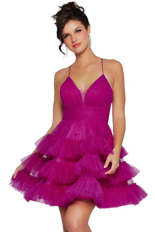 Showcase your style and elegance with the Jovani 39655 Short Layer Tulle Shimmer Homecoming Dress. This stunning dress features a flared silhouette, corset back, and backless design, perfect for any special occasion. Made with high-quality tulle fabric, this dress will shimmer and shine, ensuring you stand out in the crowd.