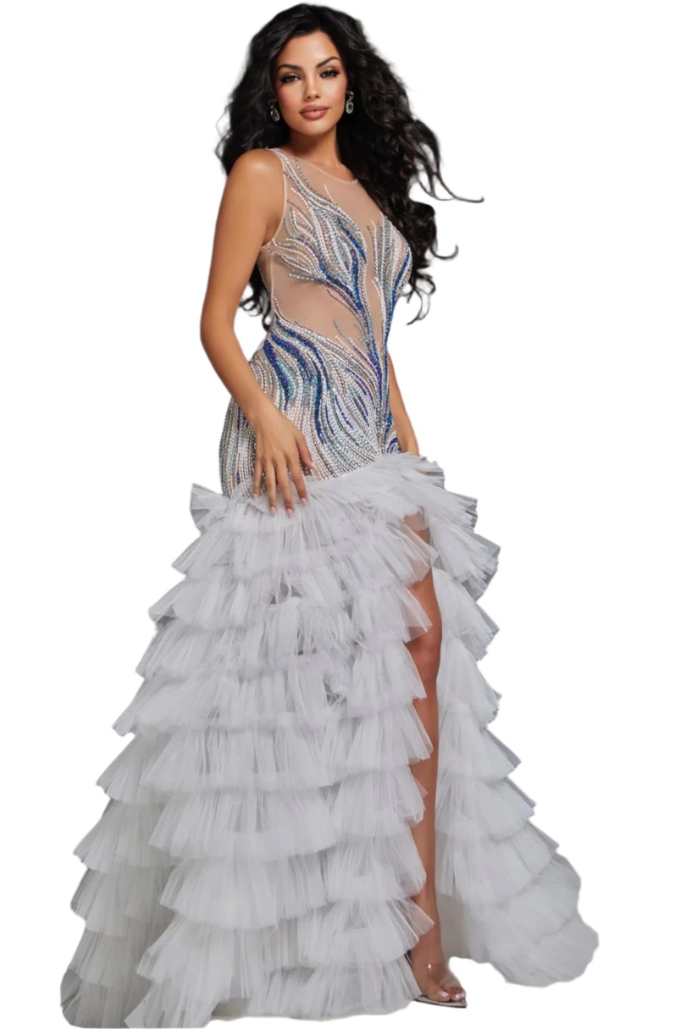 Expertly crafted for pageants, this Jovani 39846 dress boasts a sheer mermaid silhouette, ruffled detailing, and intricate crystal beadwork. With a layered design and a dramatic maxi slit, this formal gown is perfect for making a statement on stage. Shine bright and exude confidence in this show-stopping dress. Make a statement in this captivating gown featuring an illusion neckline that beautifully highlights the intricate beadwork on the bodice. The fitted silhouette through the hips elegantly transitions