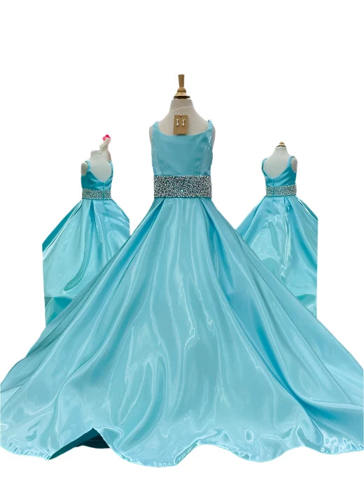 Indulge in luxury and sophistication with the Ashley Lauren 8276 Girls Satin Ballgown. This exquisite piece features a beautiful satin fabric that flows effortlessly, while the embellished crystal waistline adds a touch of glamour. Perfect for your little princess, this ballgown will make her feel like royalty.