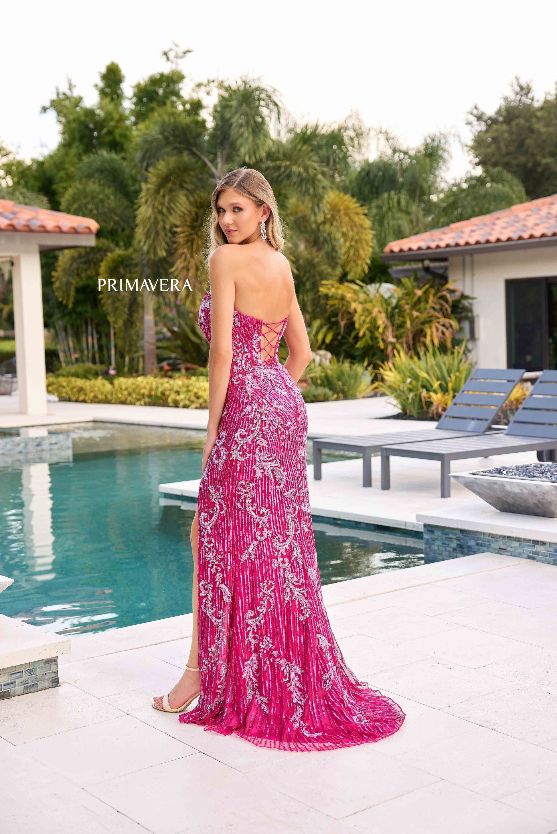 This elegant gown from Primavera Couture features a strapless sweetheart neckline with intricate beaded and sequined detailing. Perfect for prom, formal events, or pageants, this dress will make you stand out with its corset bodice and thigh-high slit. Look and feel like a true queen in this stunning evening gown.

Sizes: 000-18

Colors: Fuchsia, Purple, Teal