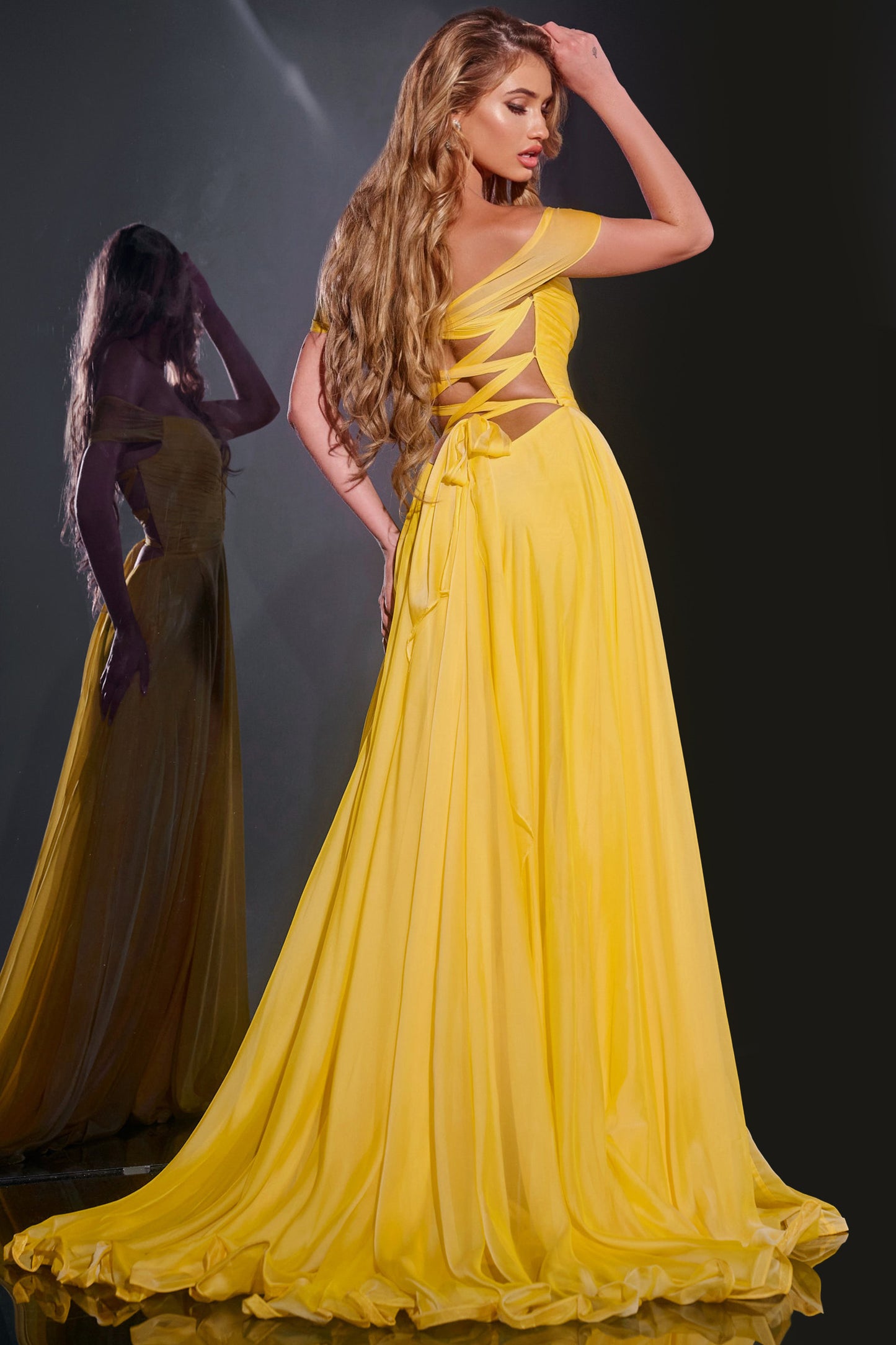 This Jovani 43842 dress is a stunning A Line maxi formal gown with a slit, corset, and chiffon material, perfect for prom or any formal event. Its off-the-shoulder design adds elegance and the backless style gives a sexy touch. Expertly crafted for a flawless fit.&nbsp;