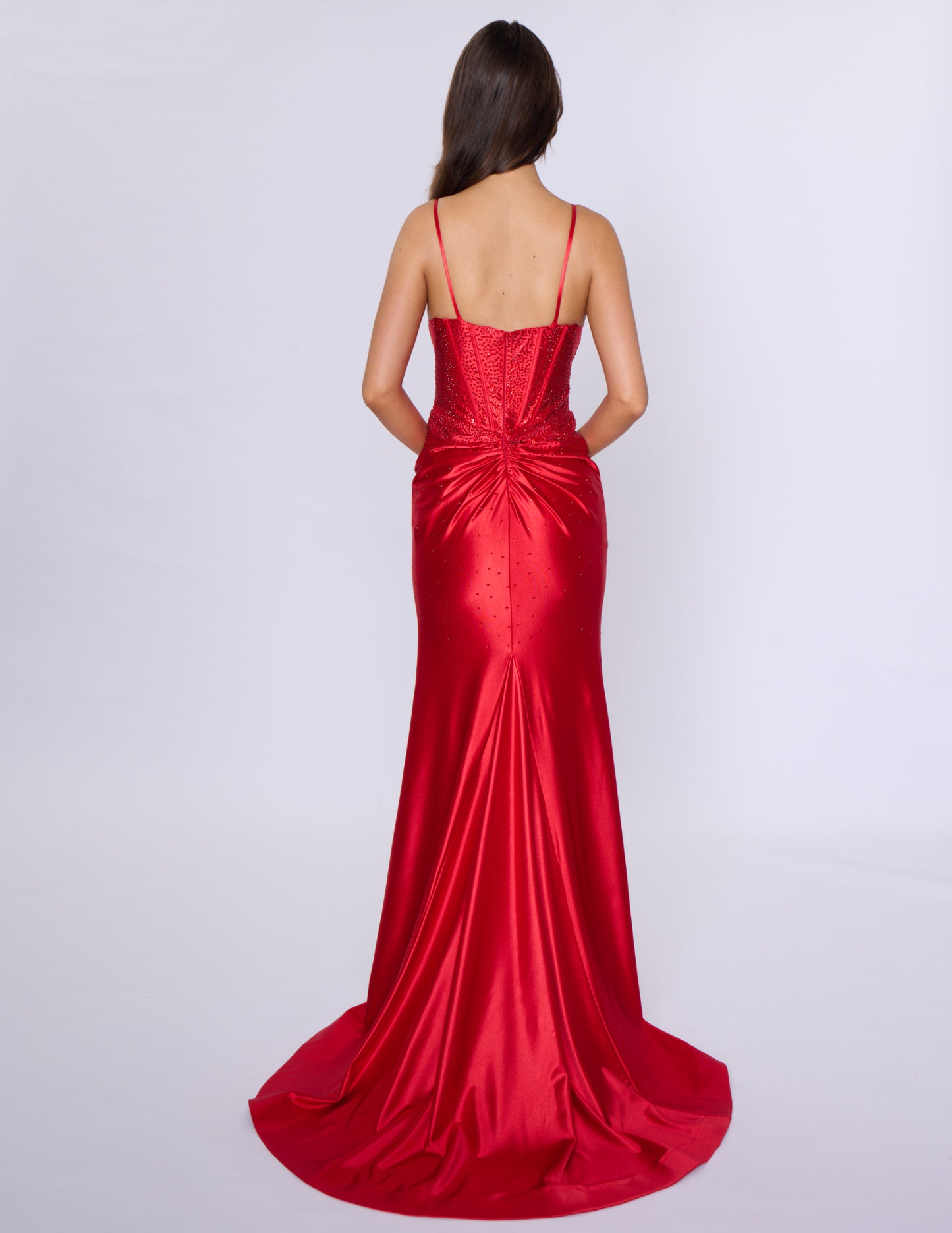 Experience elegance and glamour with our Nina Canacci 6687 long fitted prom dress. Featuring a crystal corset and a V-neck with a tasteful slit, this dress is perfect for formal evening events. Its figure-hugging fit and intricate details will make you stand out and feel confident all night long.

Sizes: 0-16

Colors: Red, Royal, Black, Blue