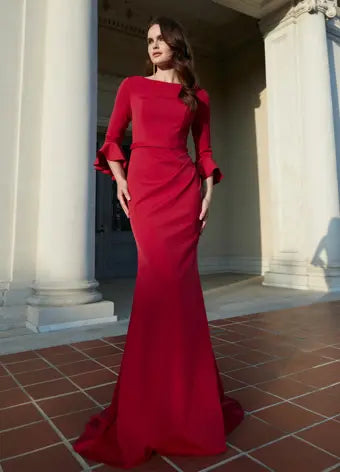 Ashley Lauren 11325 Crew Neck Three Quarter Flutter Sleeves Ruched Skirt Fitted Gown. This timeless and elegent evening gown features flutter three quarter sleeves. The skirt is adorned with ruching and finished with a sweep train.