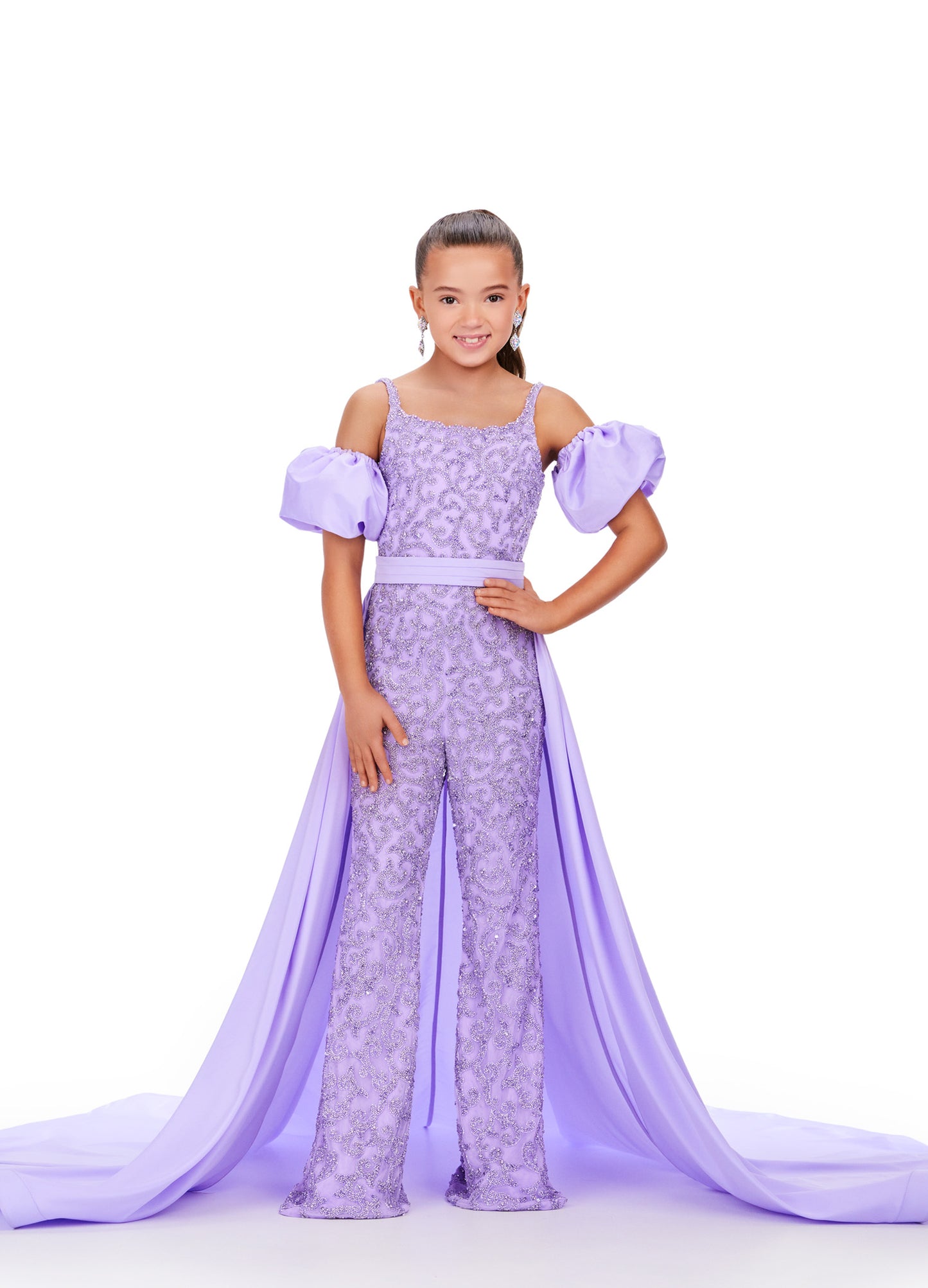 Introducing the Ashley Lauren Kids 8269 Girls Beaded Jumpsuit, the perfect combination of fun and elegance for your little one. Adorned with exquisite beading and a stylish overskirt, this jumpsuit is ideal for formal events and pageants. Enhance your child's fashion and confidence with this stunning piece