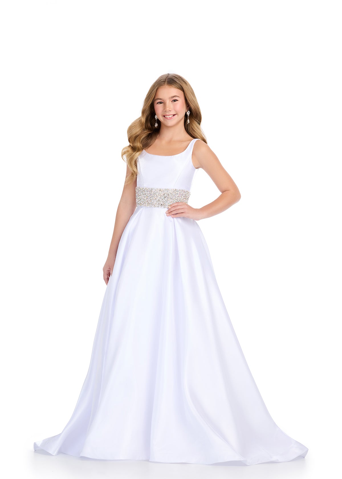 Indulge in luxury and sophistication with the Ashley Lauren 8276 Girls Satin Ballgown. This exquisite piece features a beautiful satin fabric that flows effortlessly, while the embellished crystal waistline adds a touch of glamour. Perfect for your little princess, this ballgown will make her feel like royalty.