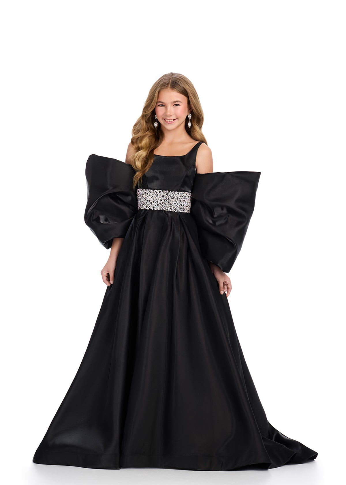 Introducing the Ashley Lauren Kids 8321 Oversize Bow Overskirt Pageant Accessory off the Shoulder Cape - the perfect addition to any pageant ensemble. The oversized bow and off the shoulder design add a touch of elegance and modernity to any outfit. Feel confident and glamorous on stage with this versatile accessory.&nbsp; Transform any outfit into a statement piece with this enchanting bow overskirt. This overskirt adds the perfect amount of glamour to any ASHLEYlauren cocktail dress, jumpsuit or dress.

B