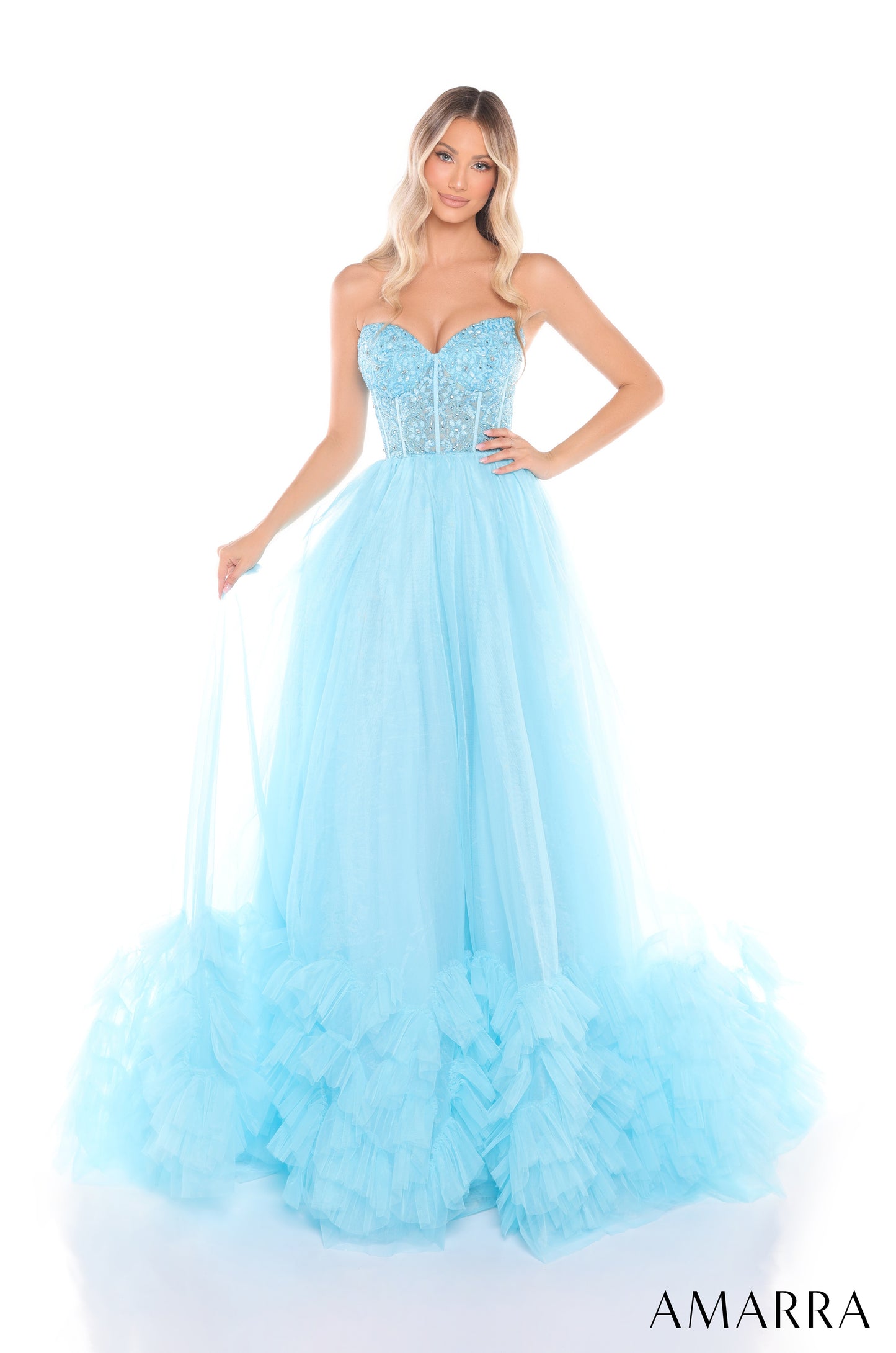 Expertly crafted with a sheer beaded corset, this Amarra 88339 prom dress offers impeccable style and elegance. The layers of pleated tulle create a striking ballgown silhouette that is sure to turn heads. Perfect for pageants or special occasions, this dress is a must-have for any fashion-forward individual.

Sizes: 000-16

Colors: Hot Pink,&nbsp;Light Blue,&nbsp;Light Pink,&nbsp;Lilac,&nbsp;Nude/Gold,&nbsp;Red