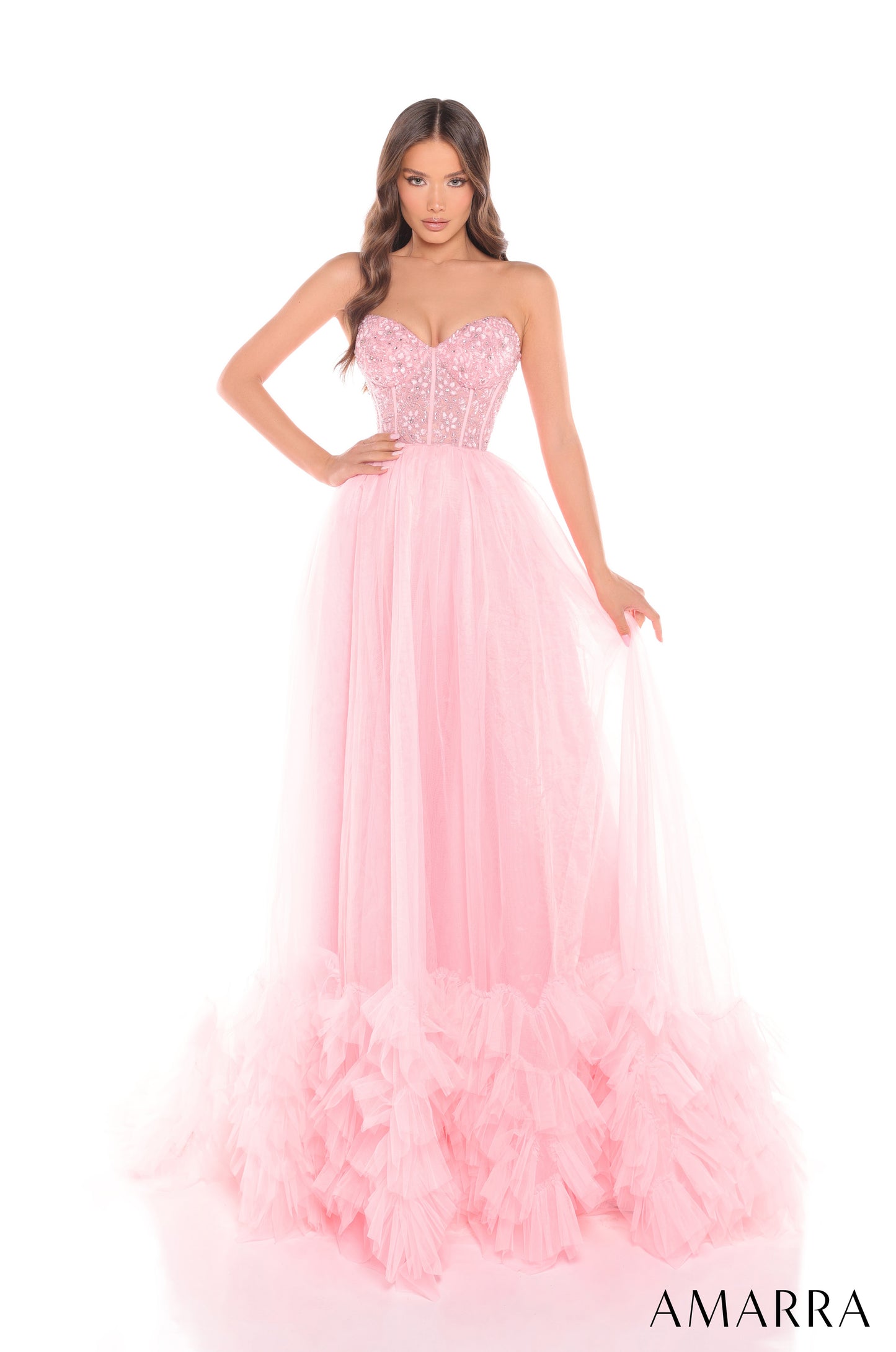 Expertly crafted with a sheer beaded corset, this Amarra 88339 prom dress offers impeccable style and elegance. The layers of pleated tulle create a striking ballgown silhouette that is sure to turn heads. Perfect for pageants or special occasions, this dress is a must-have for any fashion-forward individual.

Sizes: 000-16

Colors: Hot Pink,&nbsp;Light Blue,&nbsp;Light Pink,&nbsp;Lilac,&nbsp;Nude/Gold,&nbsp;Red