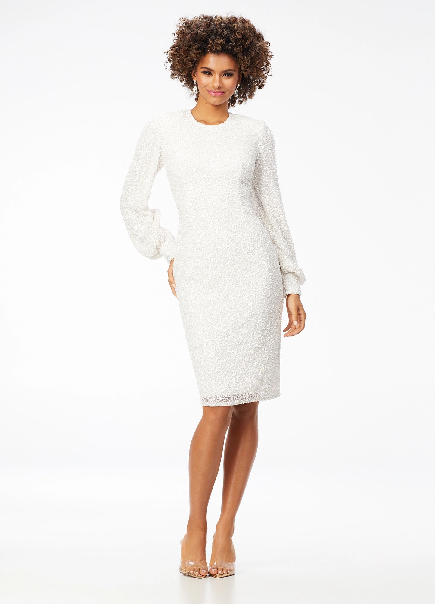 Ashley Lauren 4496 Sequin Bishop Sleeve Crew Neck Tea Length Cocktail Dress. Elegant sequin gown featuring a crew neckline with bishop sleeves. The look is completed with a fitted tea length skirt and full zipper back.