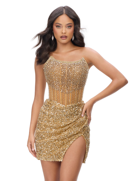 Ashley Lauren 4564 Gold Strapless cocktail dress beaded with exposed boning. The wrap sequin skirt completes the look.