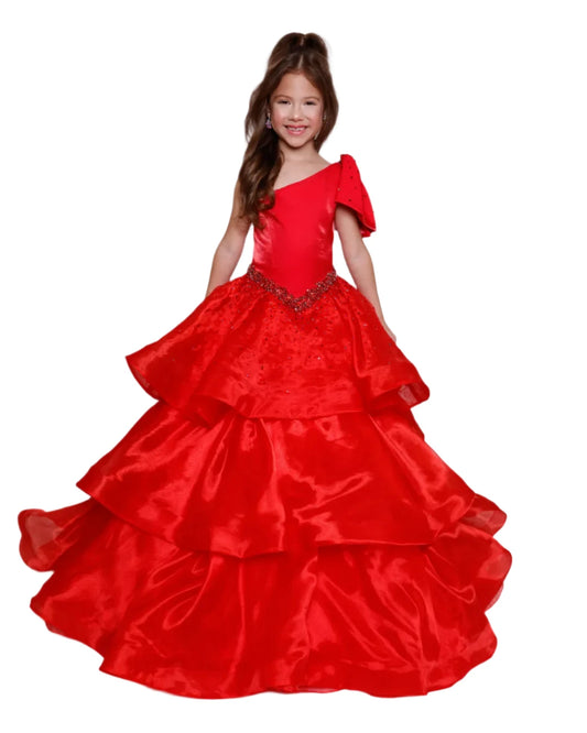 The Ava Presley Girls 39891 Long Pageant Ball Gown is a stunning formal dress designed with a one shoulder style and elegant ruffle details. The drop waist accentuates the silhouette and the layered skirt adds a touch of charm. Perfect for any special occasion, this gown exudes sophistication and grace. Turn heads in this Ava Presley 39891