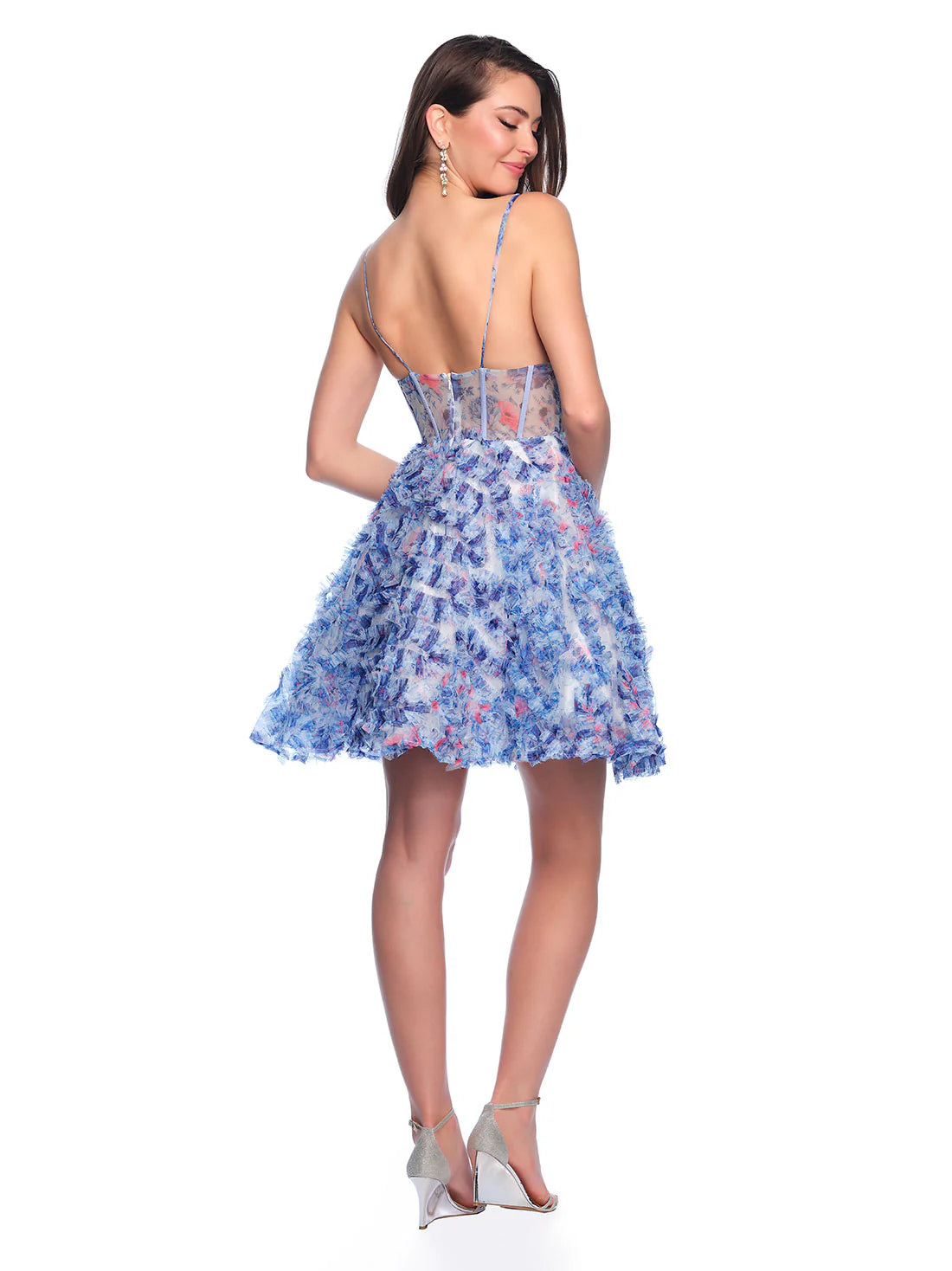 This Dave &amp; Johnny 11768 Short Ruffle Floral Homecoming Dress blends a charming floral print with a sheer corset top for a unique and stylish look. The A-line silhouette is flattering and comfortable, making it perfect for any cocktail occasion. Upgrade your wardrobe with this beautiful and fashion-forward gown.