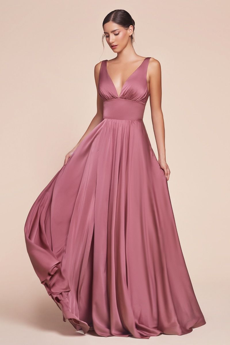 Ladivine 7469 Bridesmaids Dress is an A-line dress features a deep V-neckline and an empire waistline, beautifully crafted from soft satin. The fitted bodice transitions into a gracefully gathered skirt, creating a flattering silhouette. This best seller is ideal for bridesmaids, wedding guests, or formal events, and is both elegant and timeless.