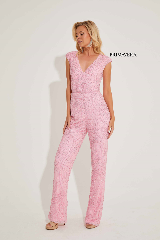 Step into the spotlight with the Primavera Couture 4275 Sequin Beaded Formal Jumpsuit. This eye-catching pageant wear features intricate sequin and bead detailing, adding a touch of glamour and sparkle to any formal event. Be the center of attention and show off your unique sense of style with this stunning jumpsuit.