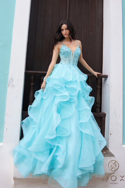 Elevate your formal look with the Nox Anabel R1433 Sheer Sequin Corset Ruffle Prom Dress. The sheer sequin corset adds a touch of shimmer, while the ruffled detail and V-neckline create a stunning silhouette. Perfect for prom or any formal event, this dress is sure to impress.

Size: 2

&nbsp;Color: Aqua