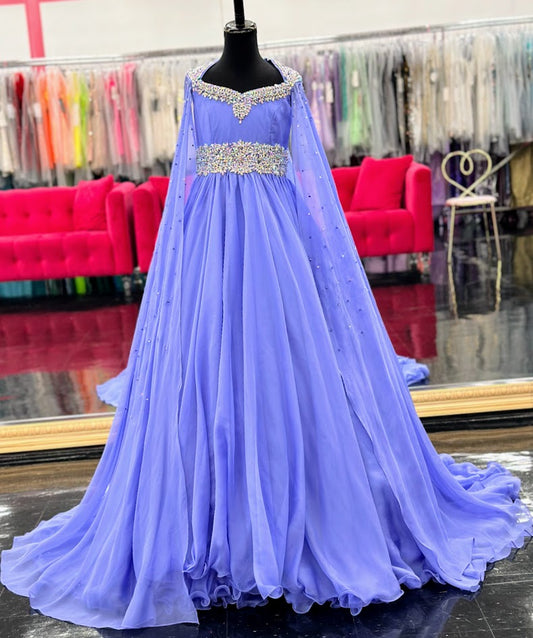 The Samantha Blake 1023 Girls Long Cape Sleeve Pageant Dress is perfect for any special occasion. The crystal cut out back and A line silhouette add a touch of elegance to the chiffon material. With long cape sleeves flowing from a cap sleeve, your child will feel like a true princess in this beautiful dress. Perfect Unique look for Pageants!