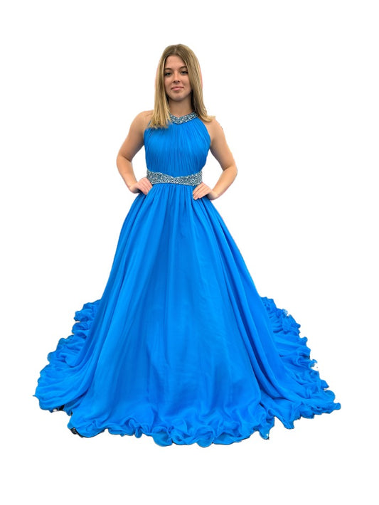 Samantha Blake 1102 Girls Pageant Dress. This stunning A Line Chiffon gown, complete with a detachable crystal Embellished cape and chiffon material, will make any young girl feel like a princess. With its train design, it offers elegance and grace for any special occasion. Get yours today and make a statement at your next Pageant.