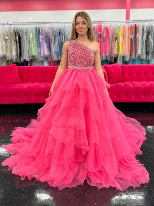 Introducing the Samantha Blake 1025 Girls Long Pageant Dress. Made with Chiffon Ruffle layers and a one shoulder design, this gown exudes elegance and sophistication. Perfect for formal events and pageants, your little girl will shine and feel like a princess in this stunning dress.&nbsp;