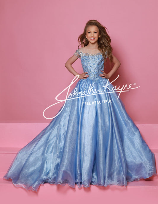  This Sugar Kayne C357 Girls Pageant Dress is a stunning ballgown that will make your little girl stand out on stage. The off the shoulder design and fringe detailing add a touch of glamour, while the shimmer fabric gives the dress a beautiful shine. Perfect for formal events and pageants.