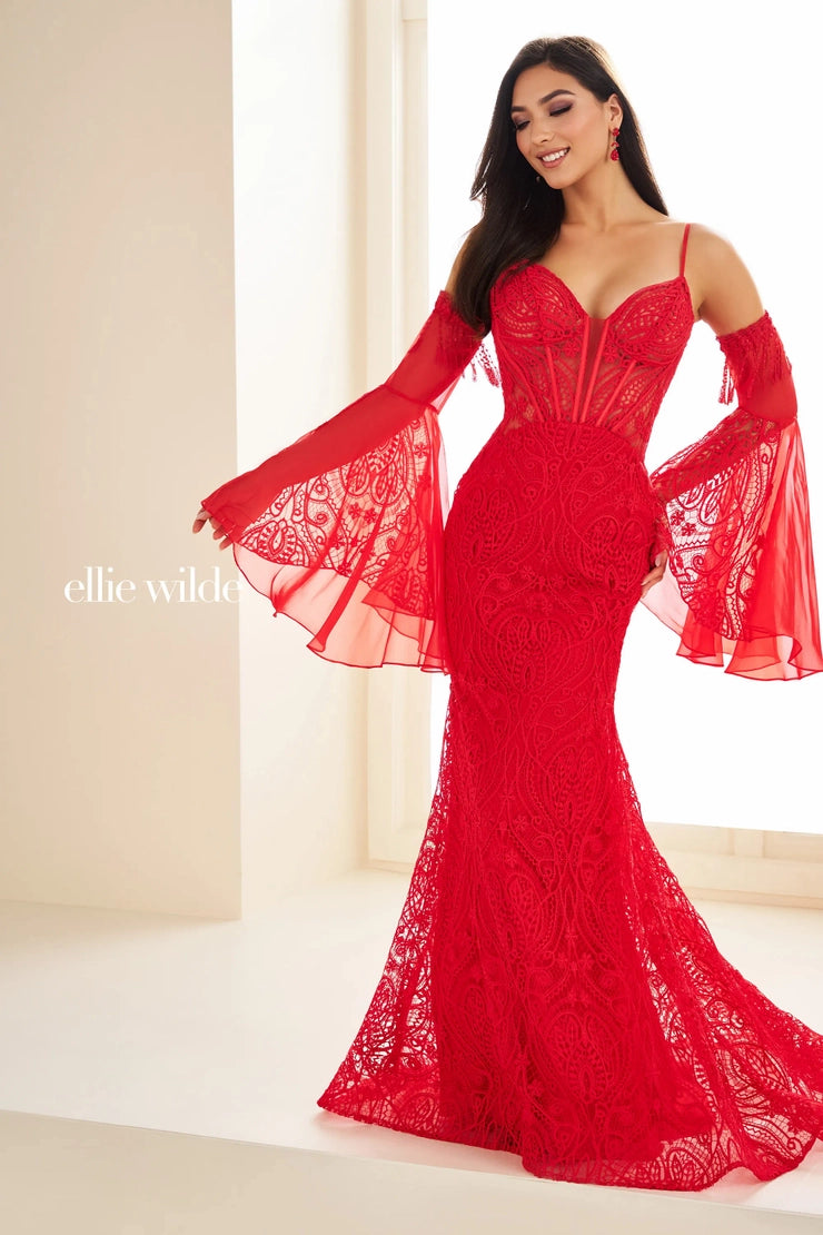 Discover the stunning beauty of the Ellie Wilde EW36030 dress. This boho-inspired mermaid gown features long bell sleeves and a sheer corset to enhance your natural curves. Perfect for bridal, evening, or reception events, this dress will make you stand out with its unique, modern design.&nbsp; Venise Lace. Back wedding dress - reception gown - bridal

Sizes: 00-24

Colors; Black/Nude, Ivory/Nude, Red, Royal Blue