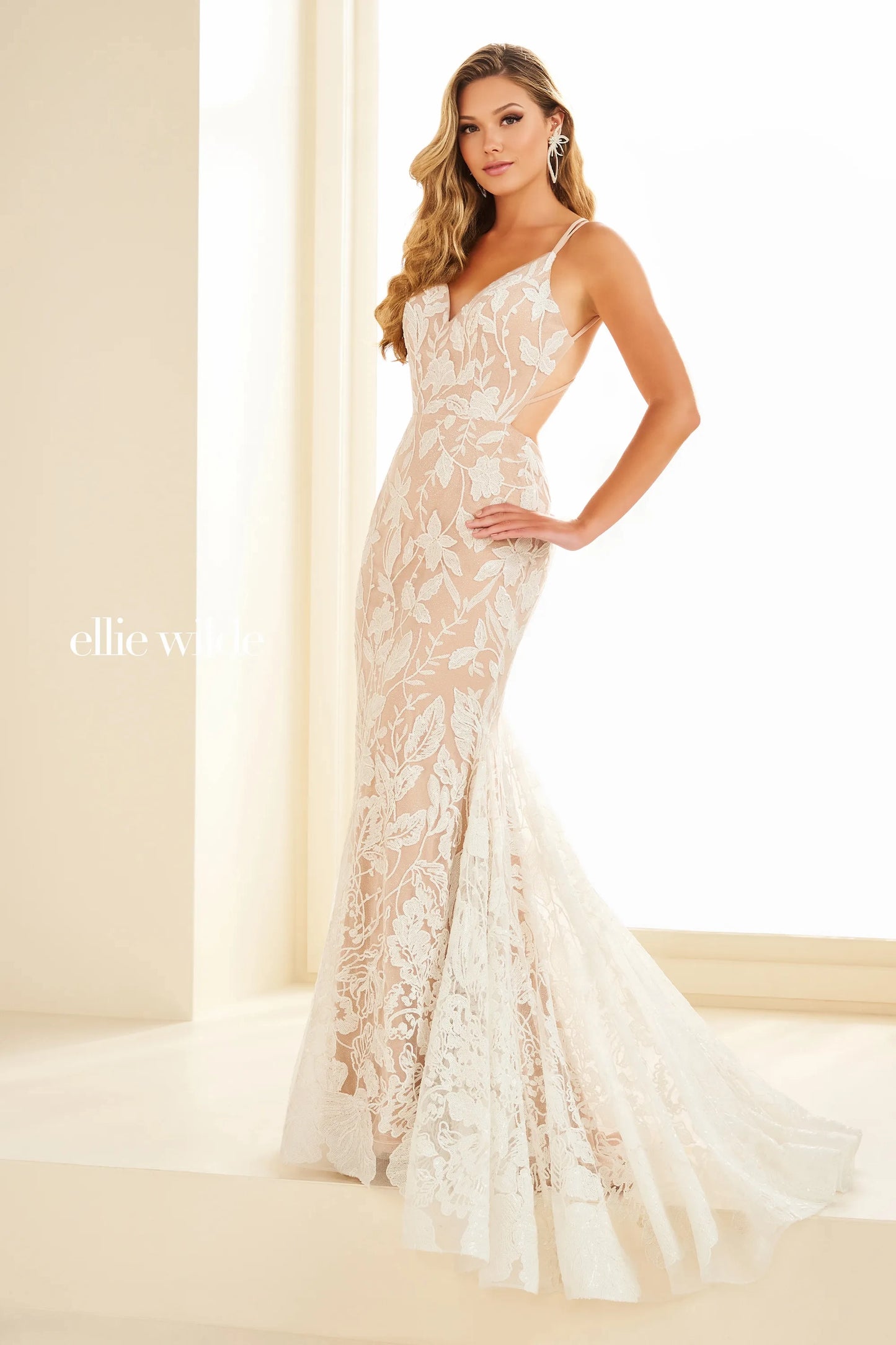 Expertly designed by Ellie Wilde EW36034 this long backless mermaid prom dress is a show-stopping piece. With its shimmering sequins and figure-flattering silhouette, this gown will make you feel like the belle of the ball. Perfect for pageants, prom, or any special occasion, this dress is sure to turn heads.